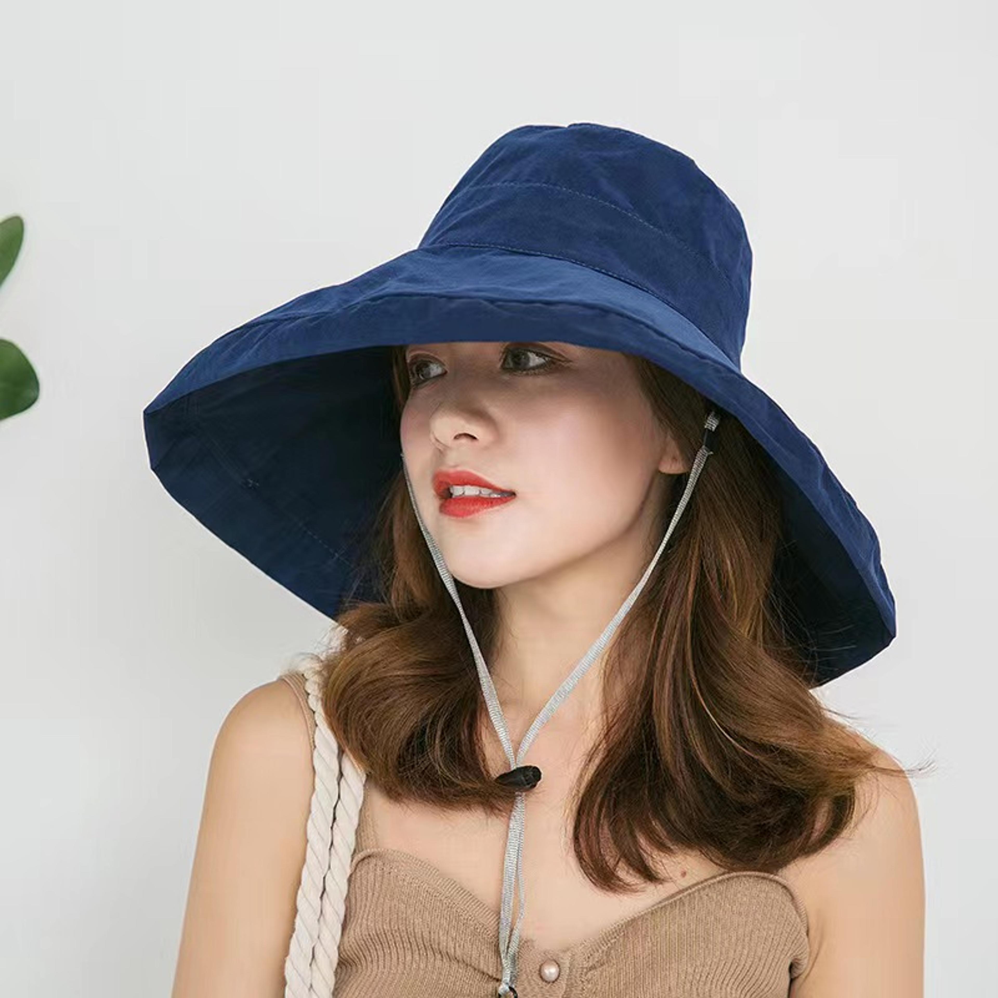 women's reversible bucket hat with wide brim uv sun protection for travel & beach