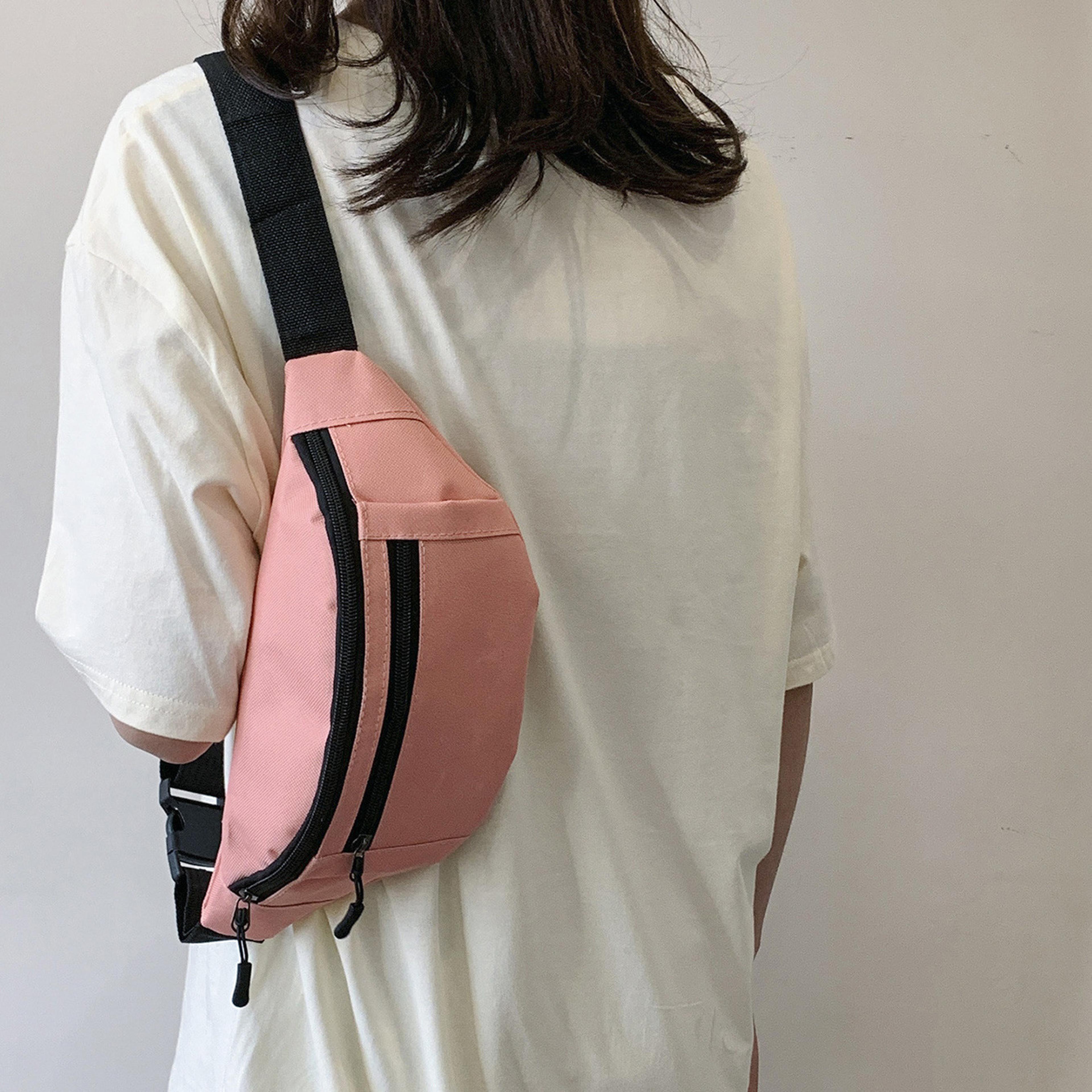 crossbody waist bag for travel, running & festivals with large phone storage