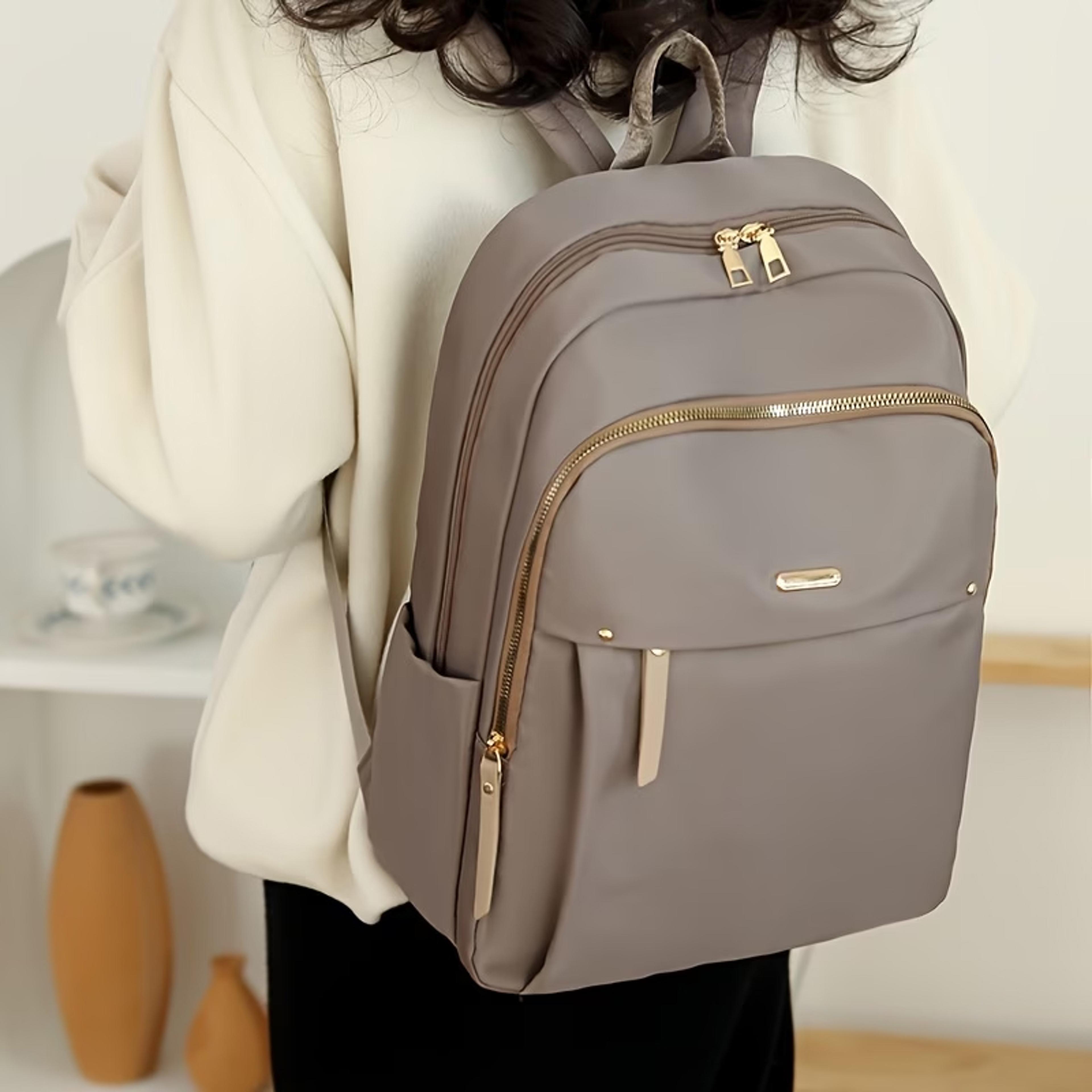 lightweight waterproof nylon travel backpack for women with gold zippers
