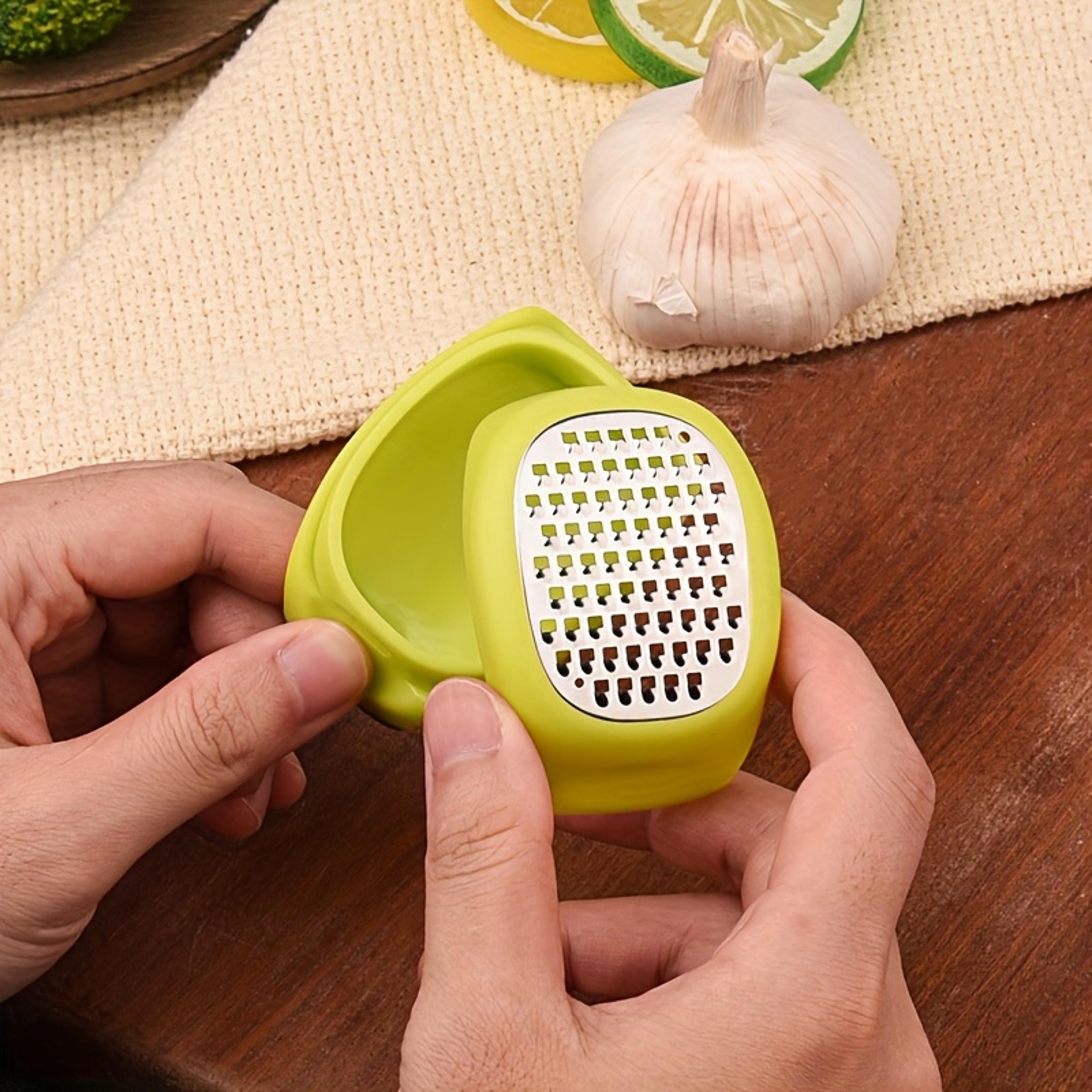 stainless steel lemon zester and cheese grater for garlic ginger and vegetables