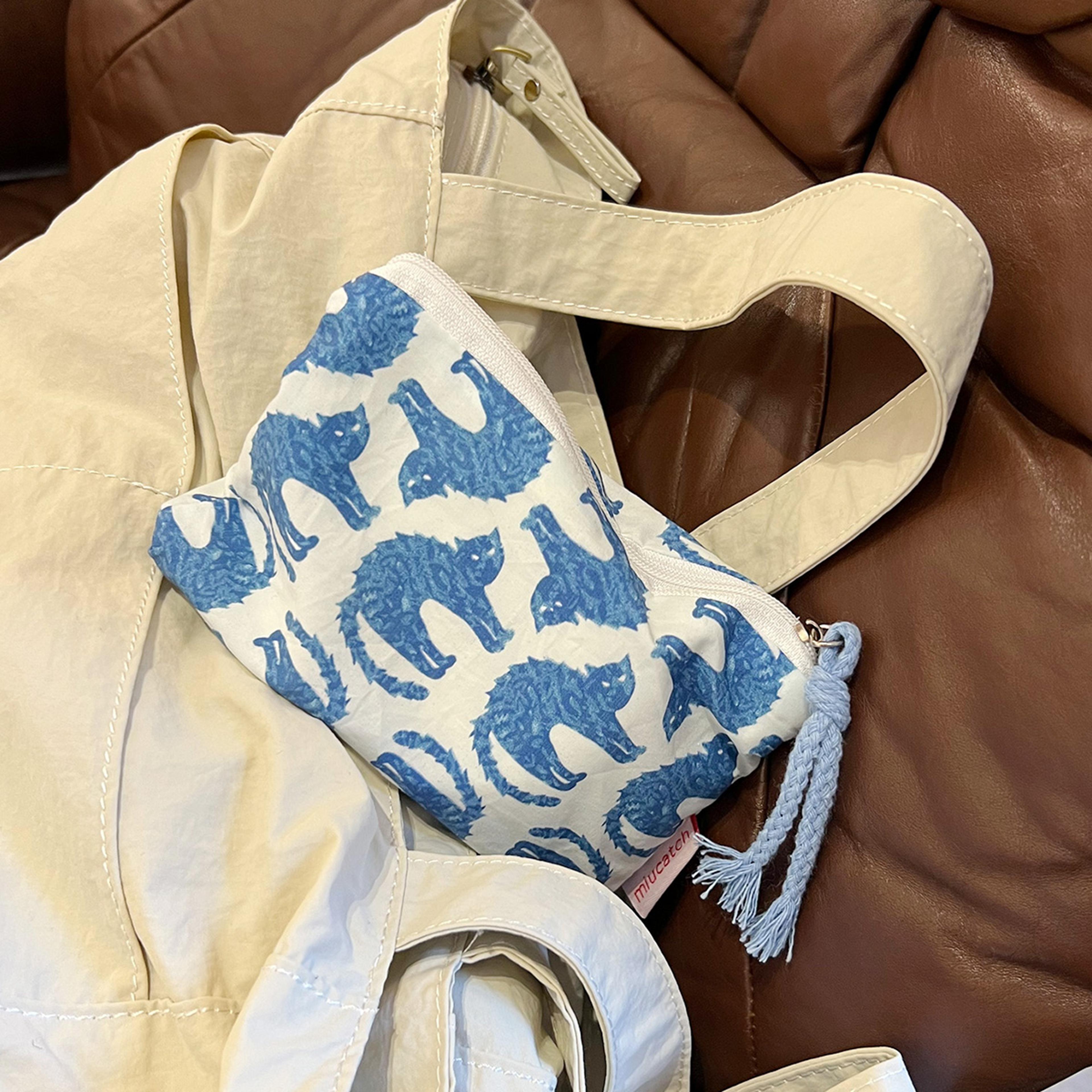 blue cat graphic mini cosmetic bag with zipper for makeup and daily essentials