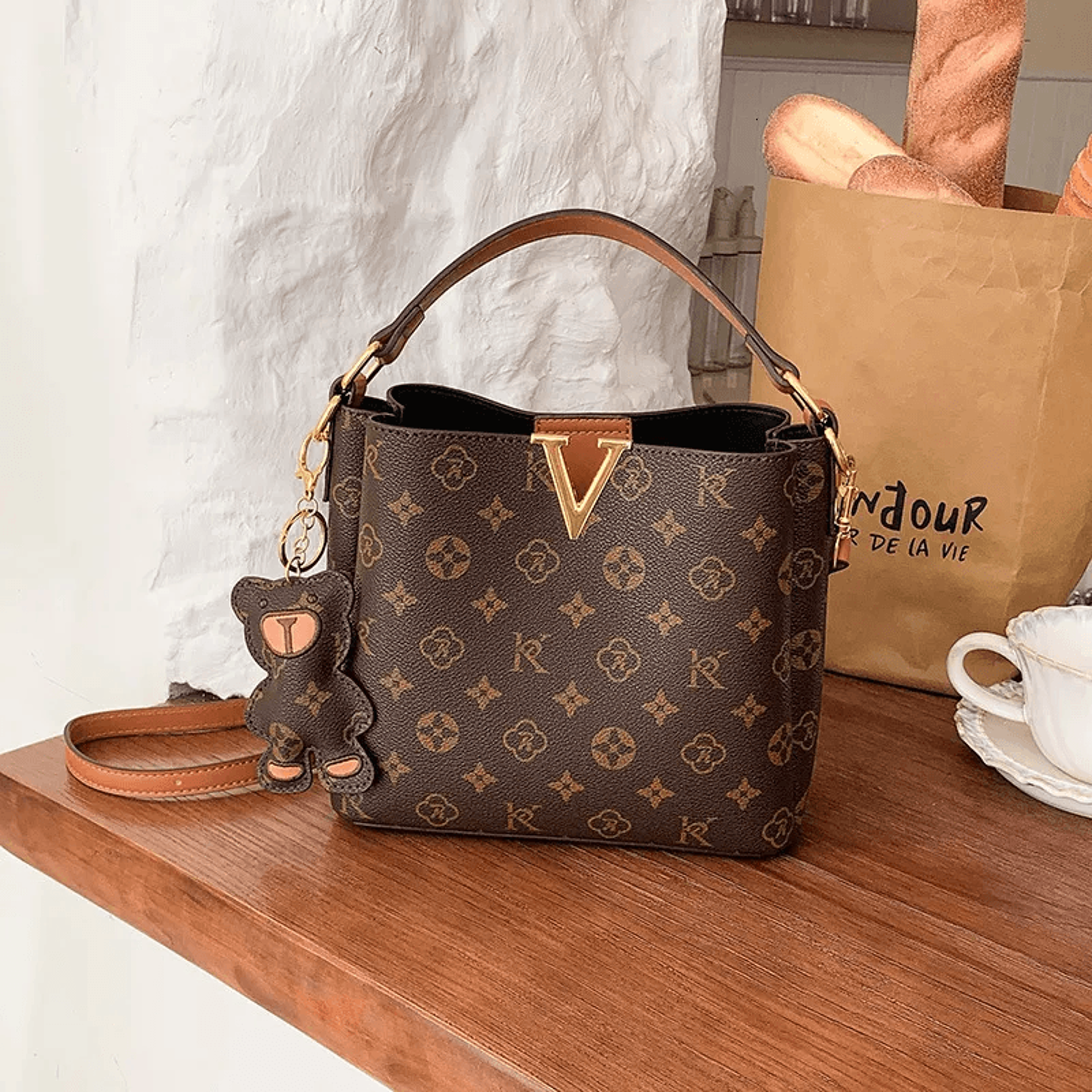 women retro bucket crossbody bag pu leather handbag with bear pendant and adjustable strap