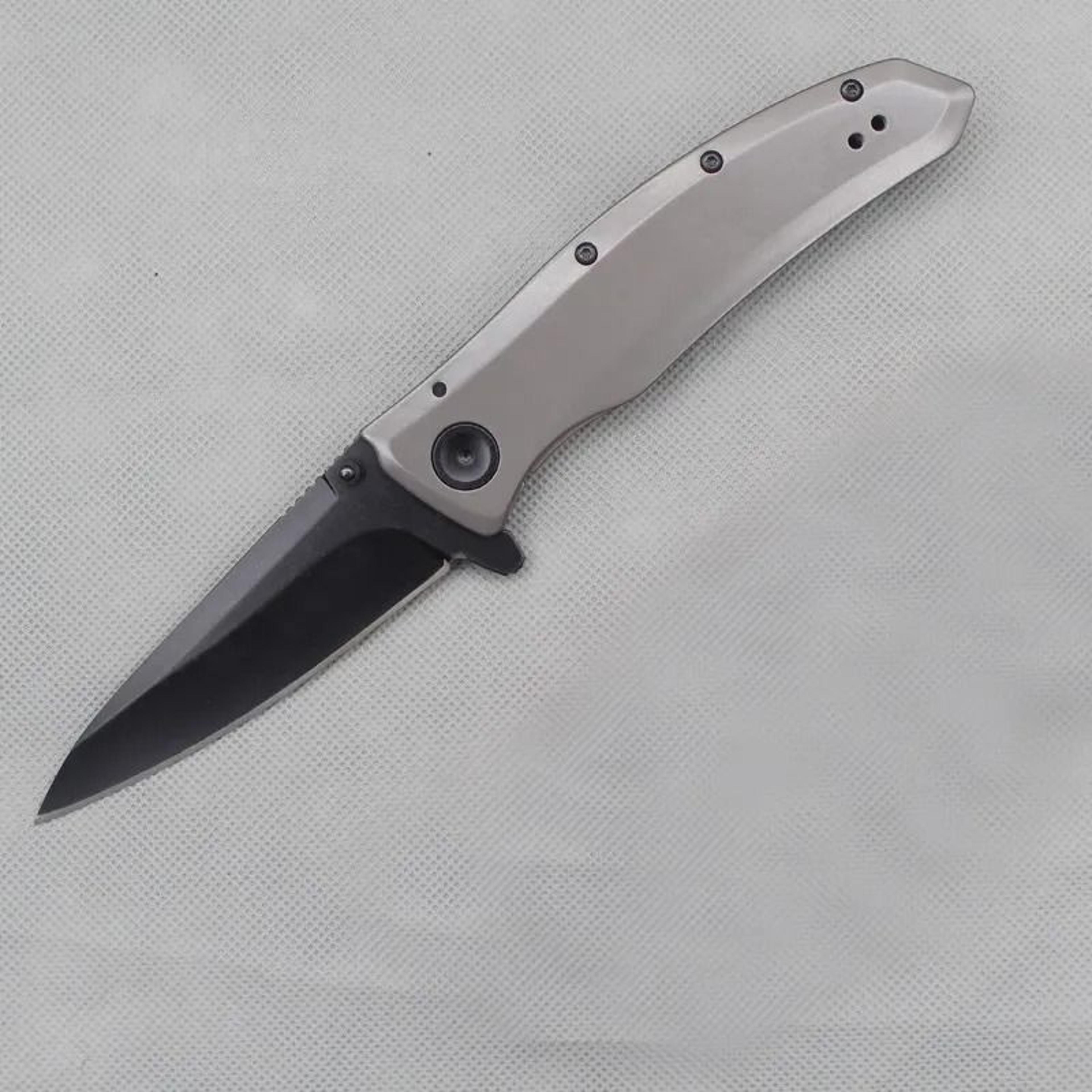 grid assisted opening pocket knife gray handle black blade