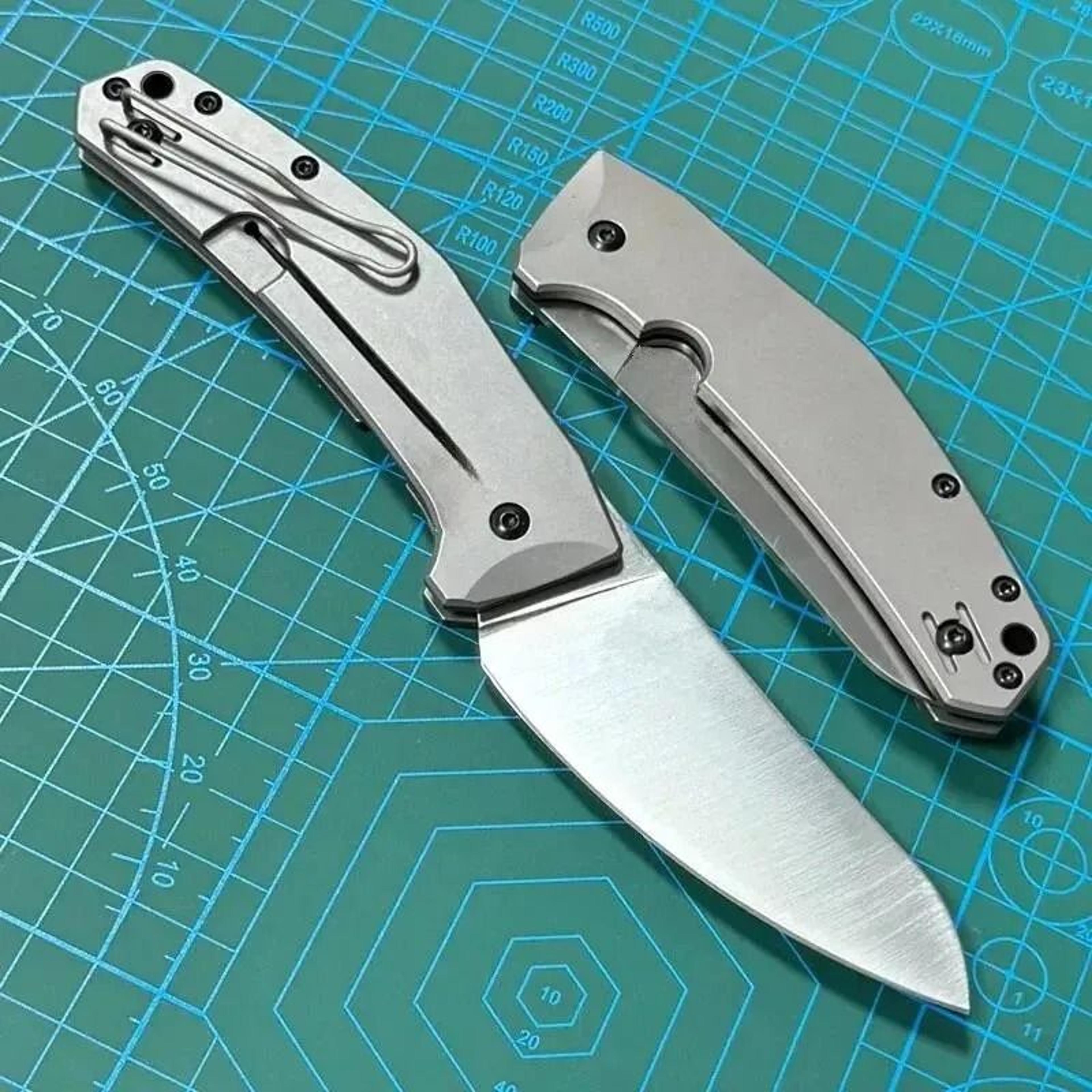 folding pocket knife with titanium handle for lightweight everyday carry
