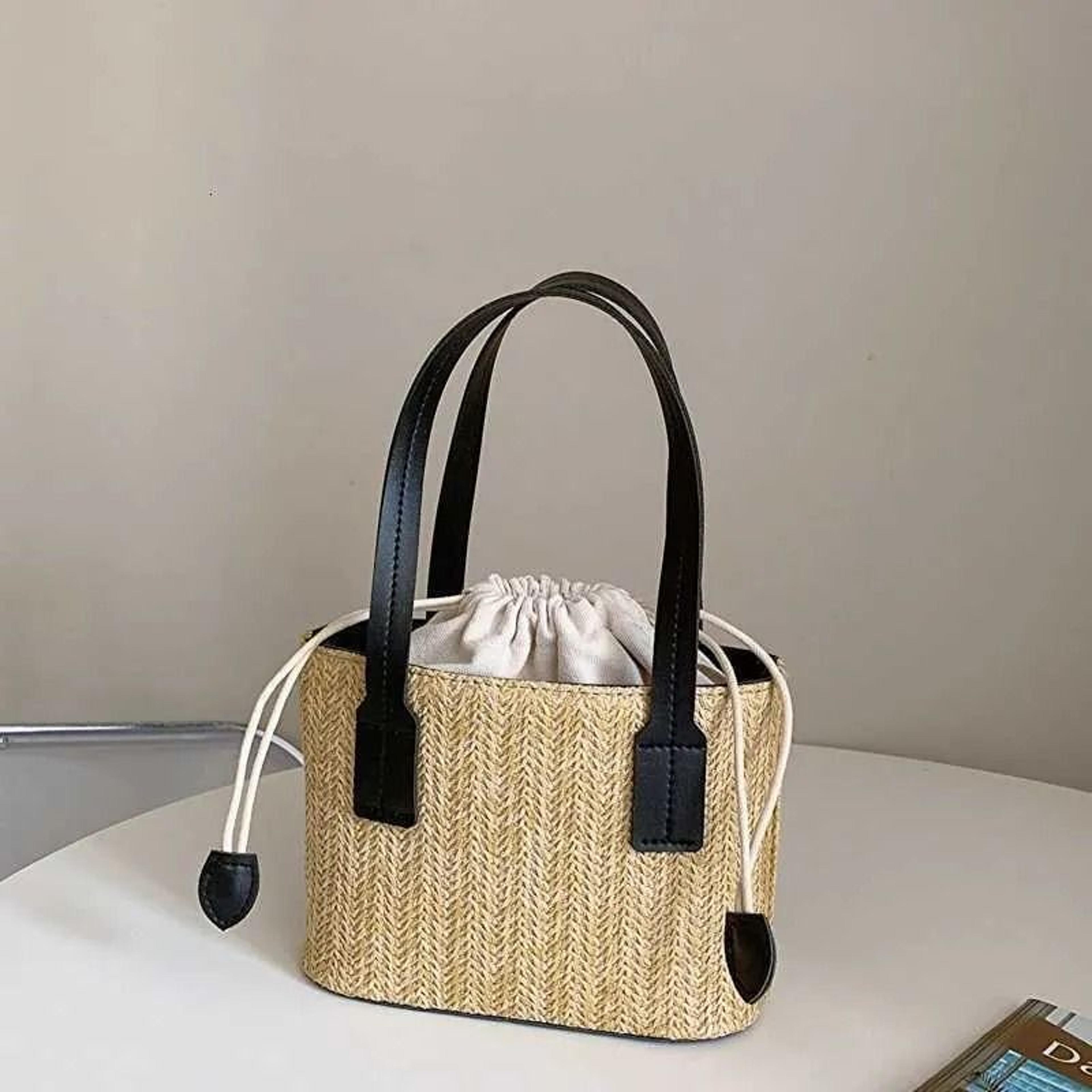 straw bucket bag drawstring woven crossbody bag for beach travel and vacation