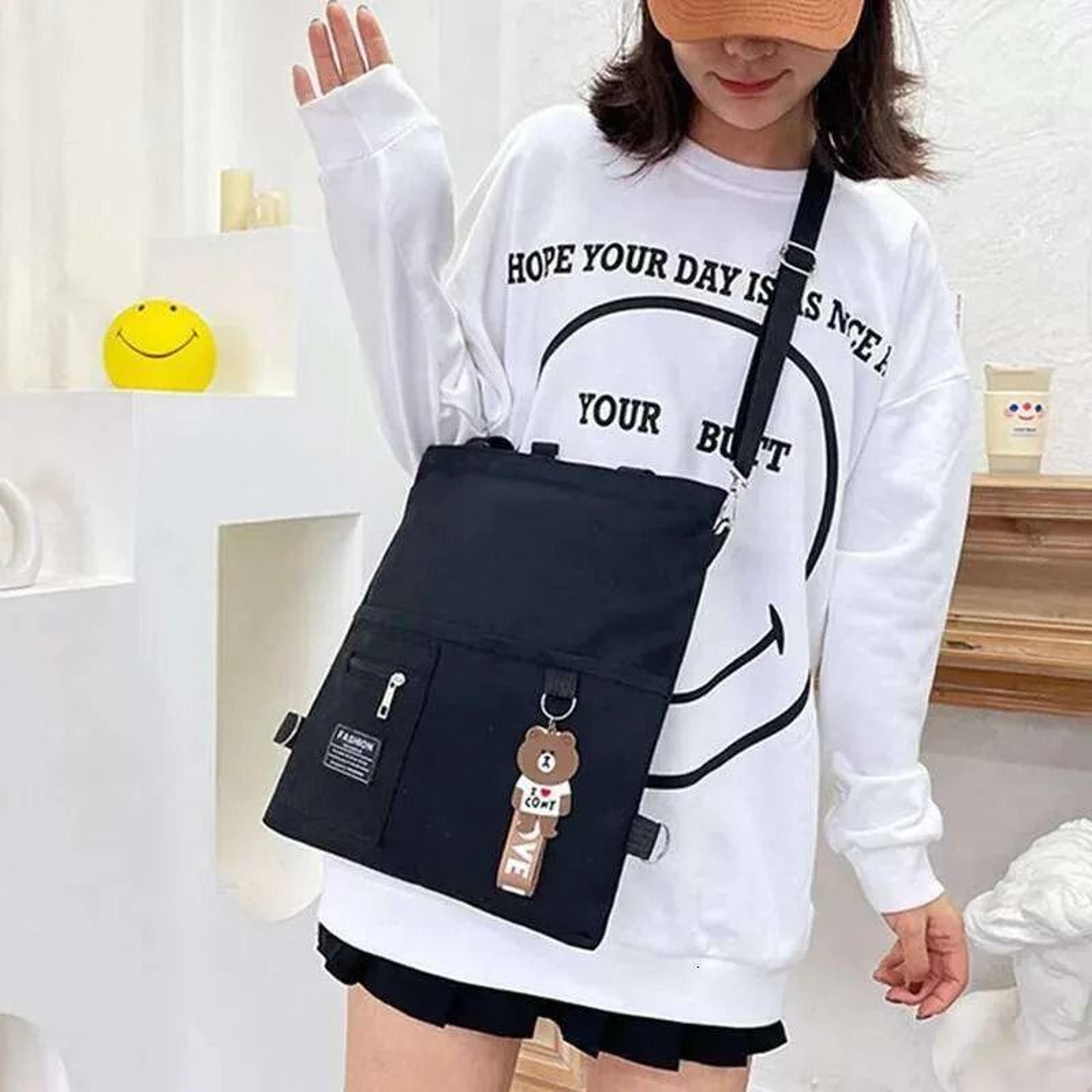 canvas crossbody tote bag with zipper closure and interior phone pocket