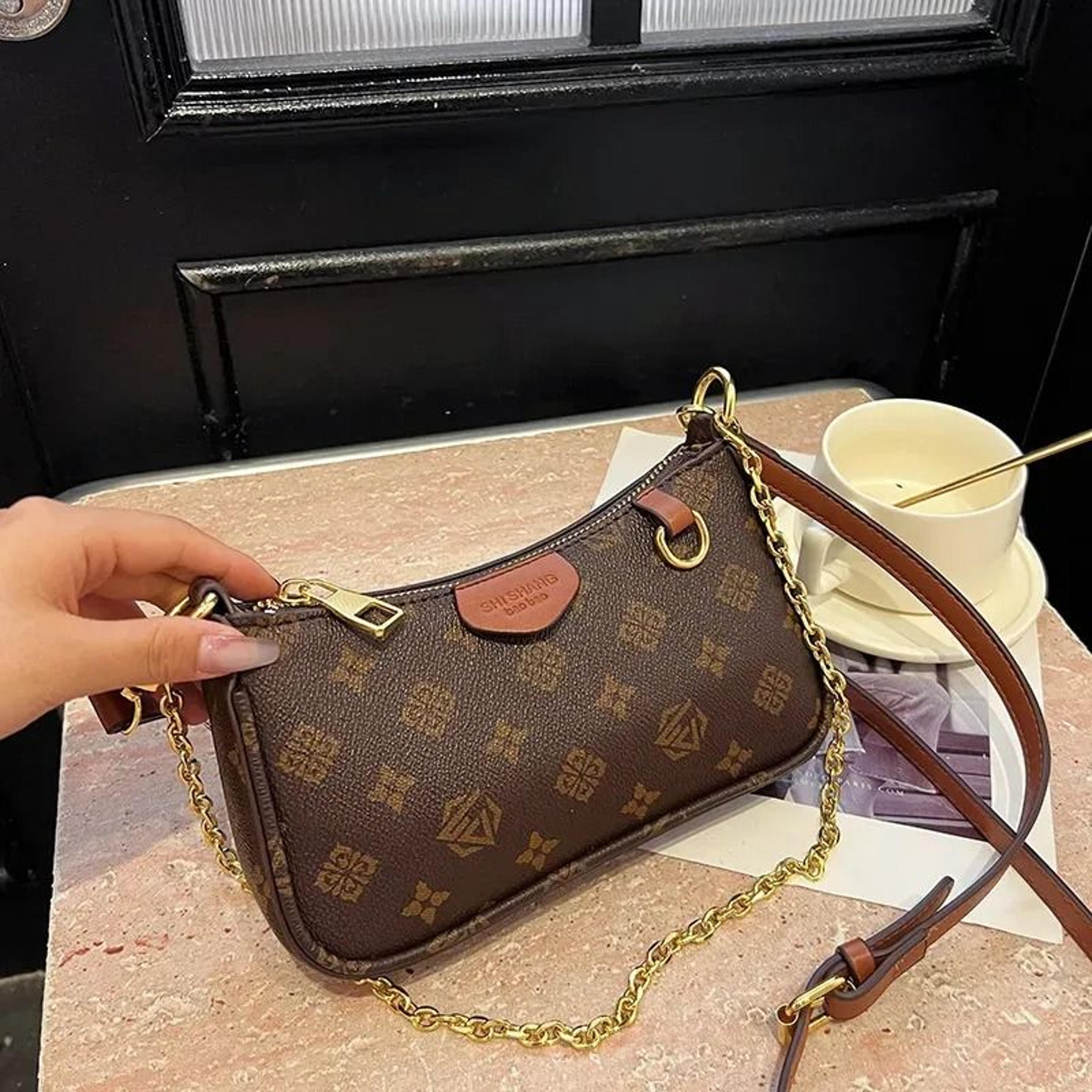 womens pu shoulder crossbody bag with zipper interior pocket and fur detail