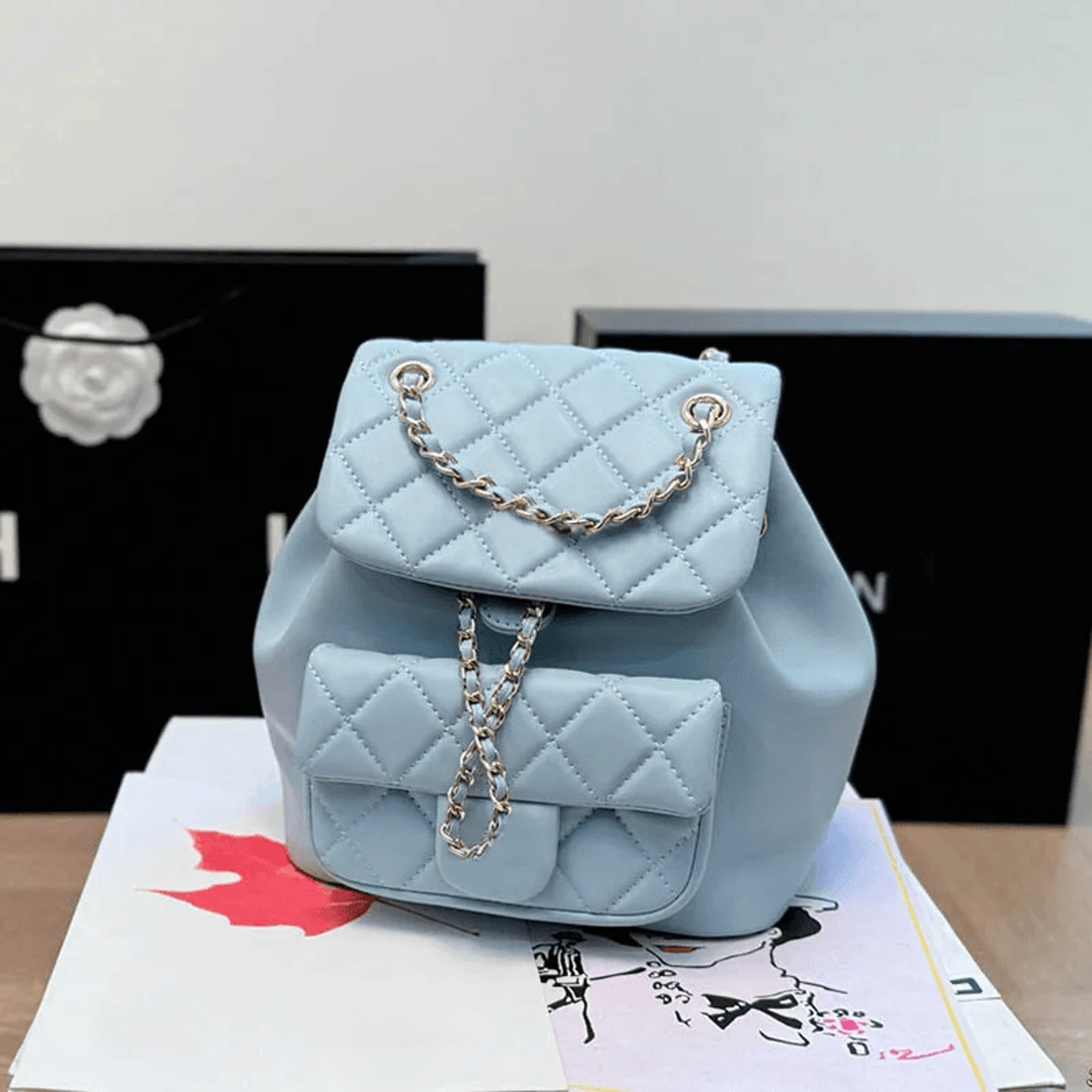womens lambskin leather mini backpack with quilted design adjustable straps and gold tone hardware