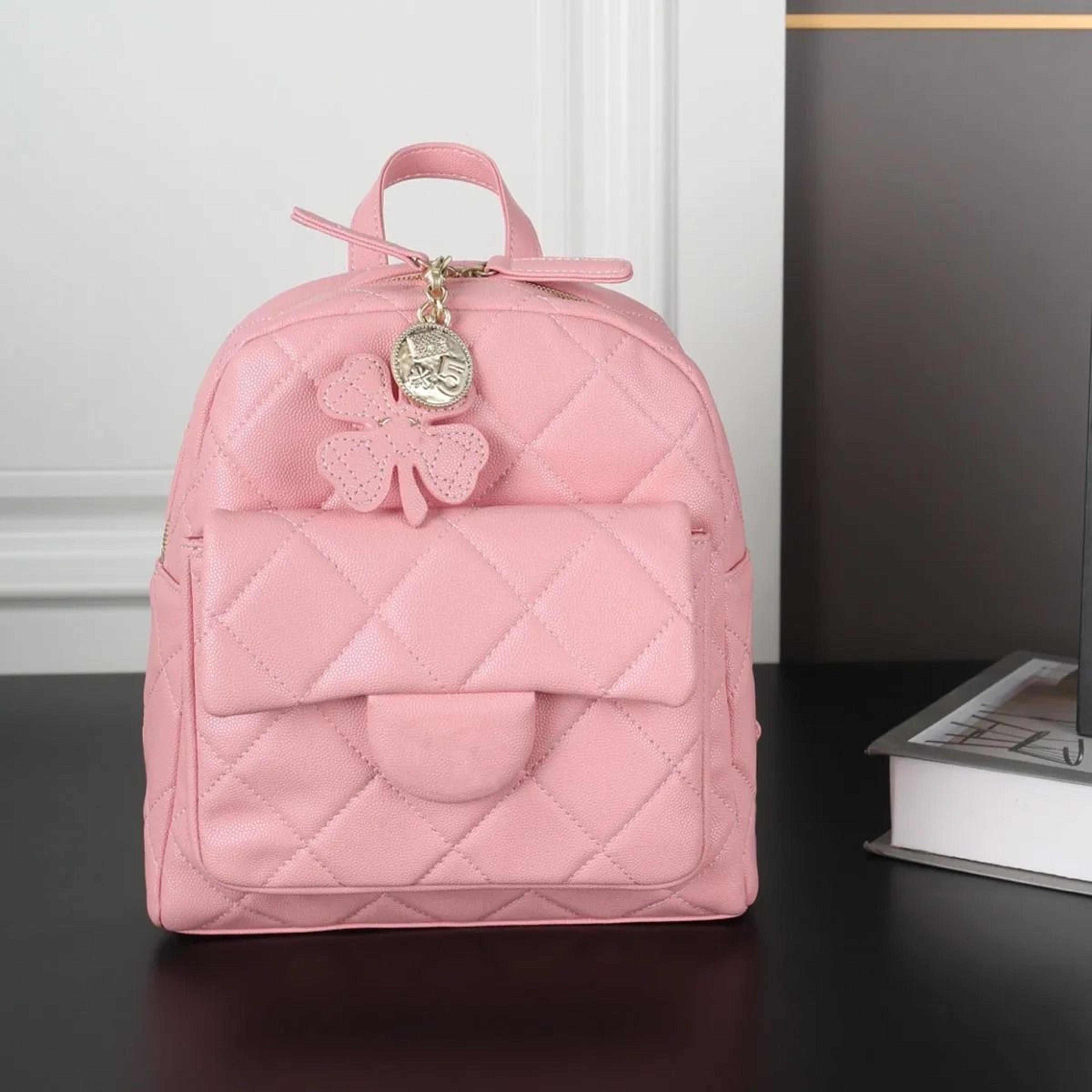 genuine leather mini backpack with adjustable dual shoulder straps and zipper closure