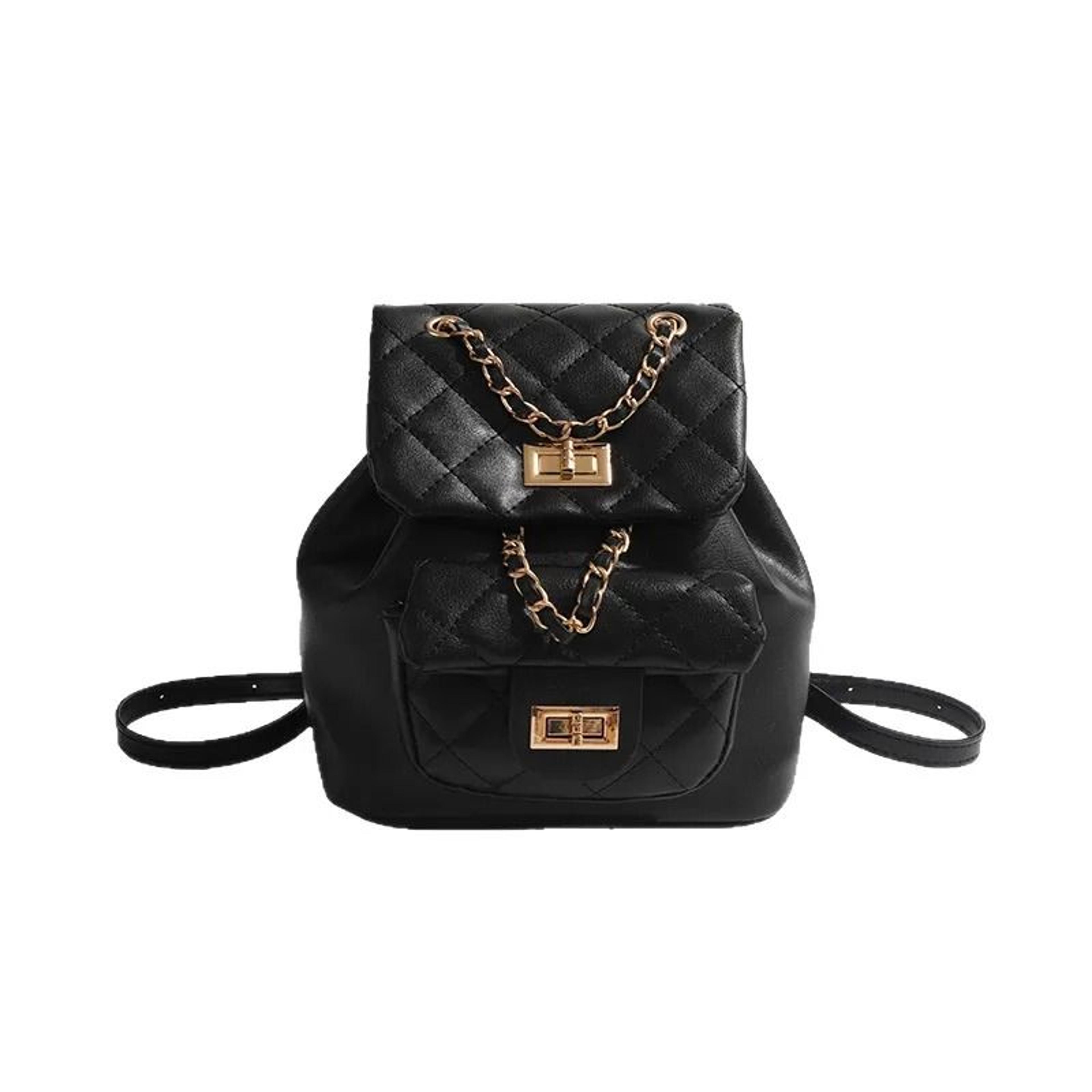 mini quilted pu backpack with zipper closure and interior compartment