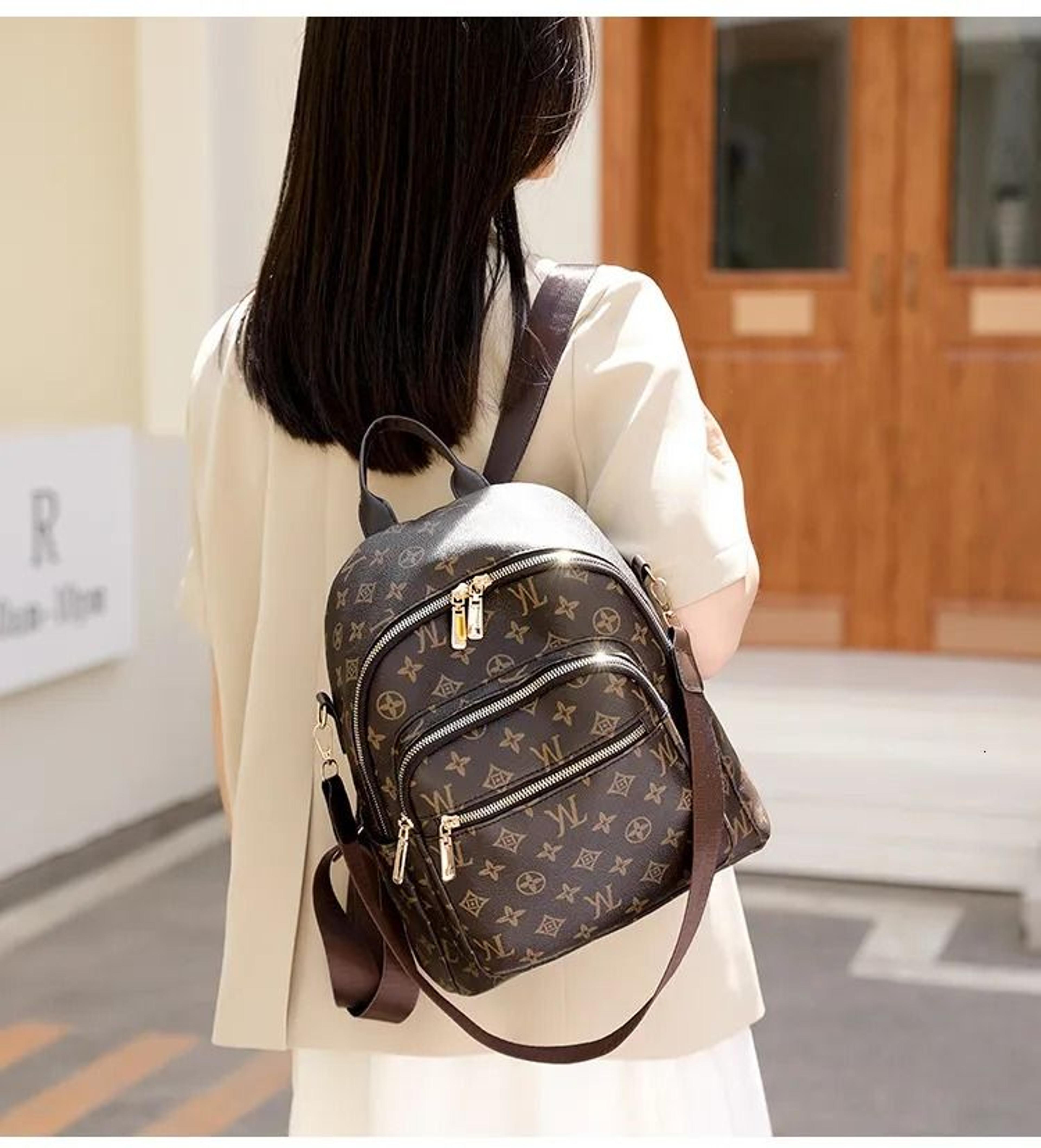 women large capacity backpack with multi-compartment storage and water-repellent material