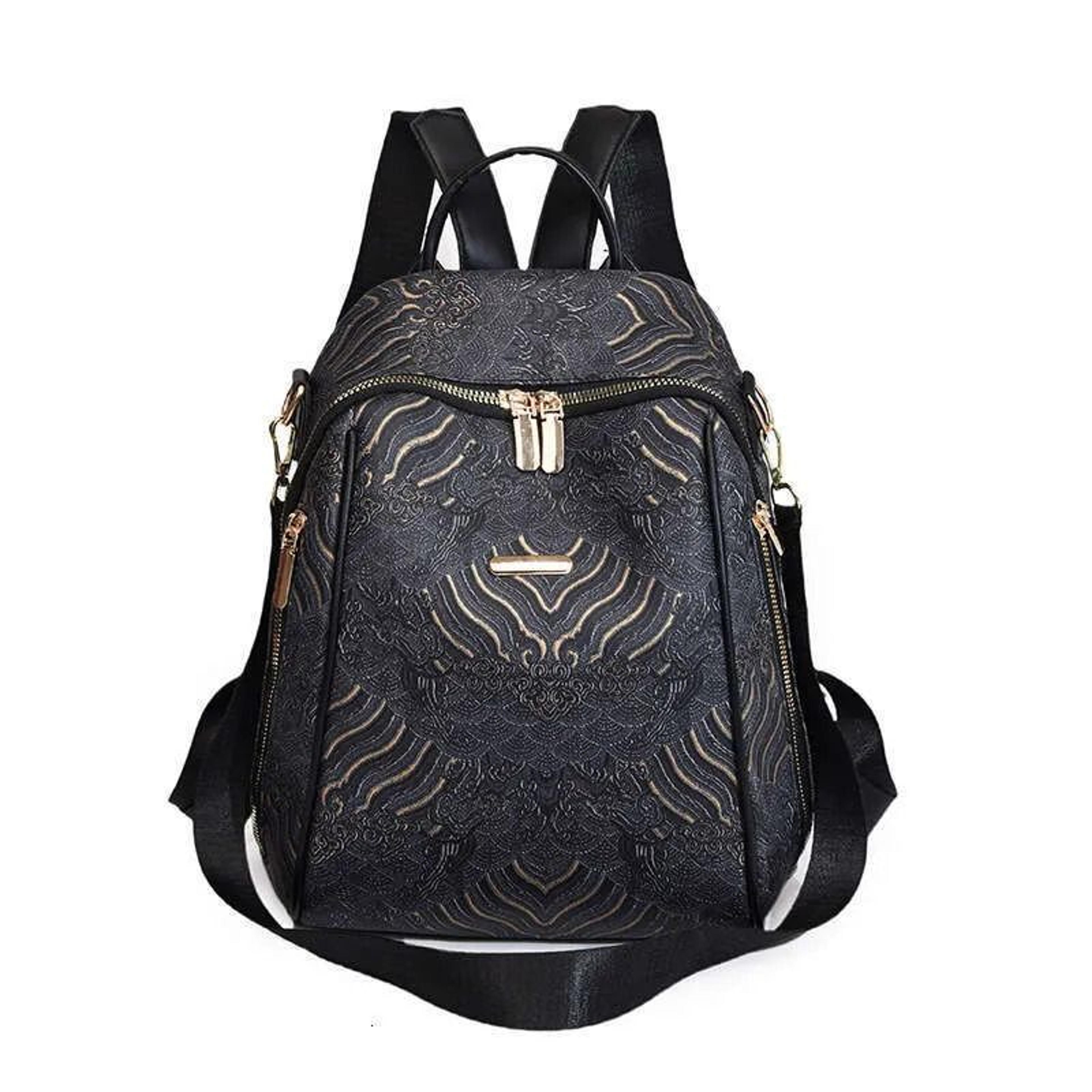 pu backpack with zipper closure lock detail and cell phone pocket