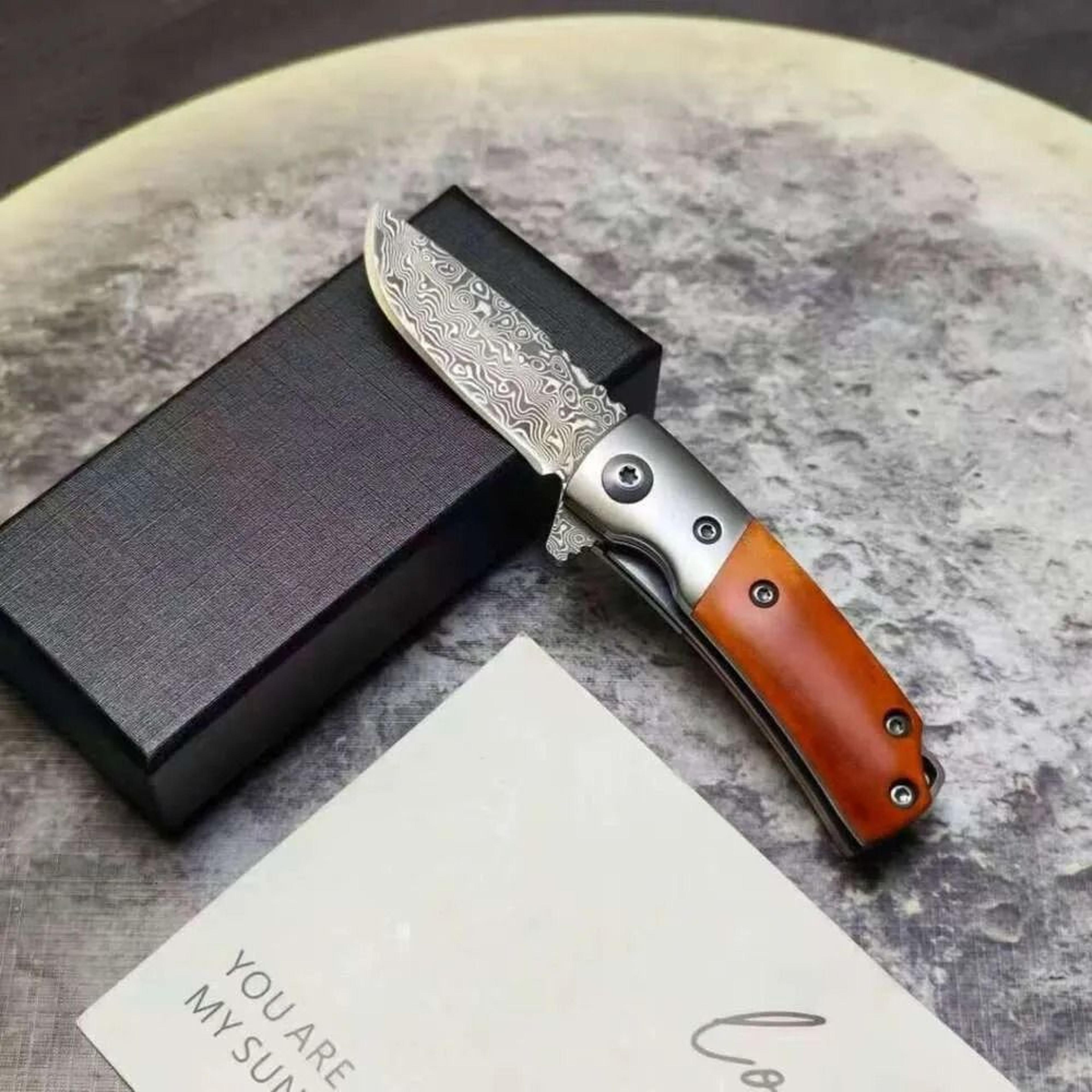 damascus steel folding knife with high hardness blade for camping and outdoor cutting