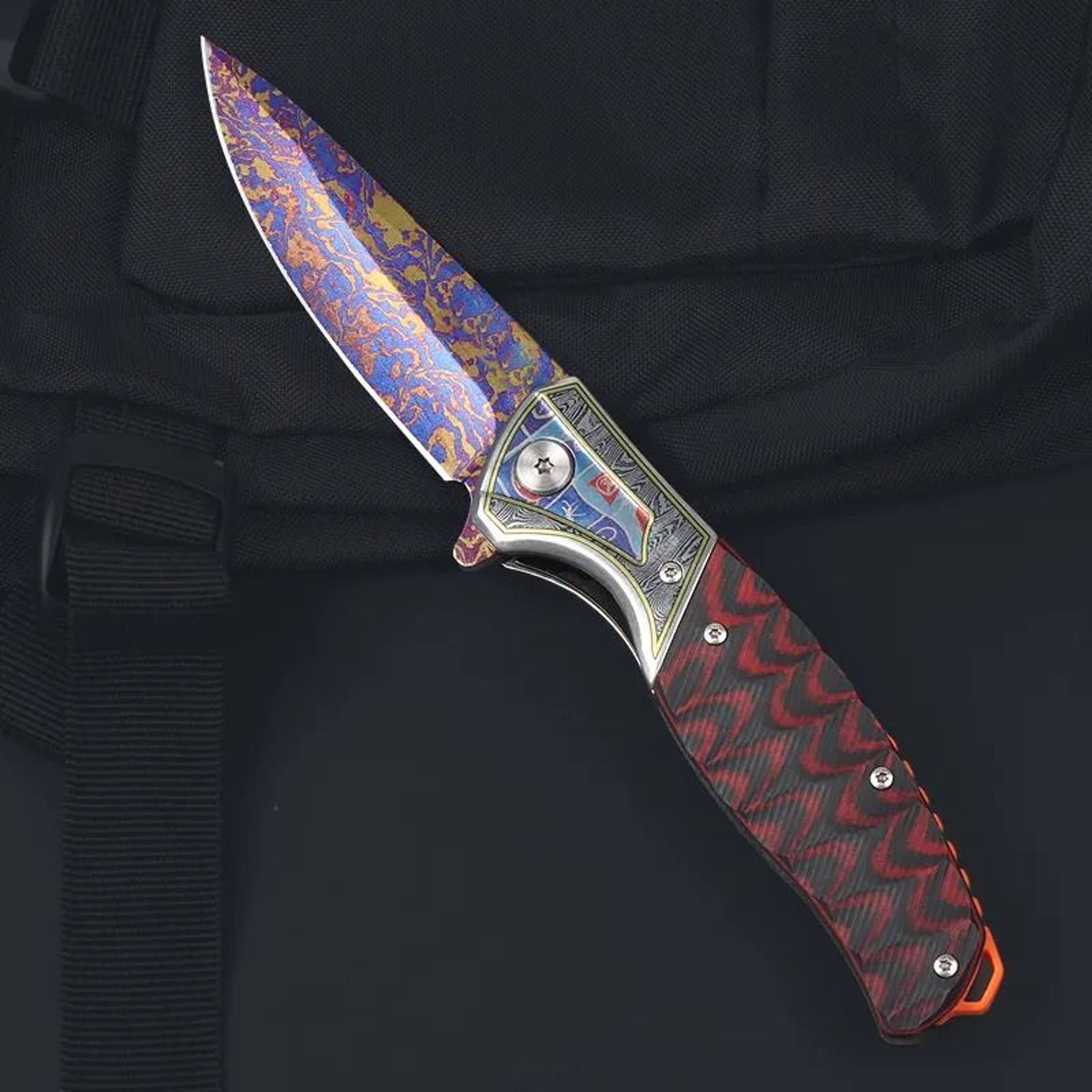 flipper folding pocket knife with titanium coated blade and steel handle