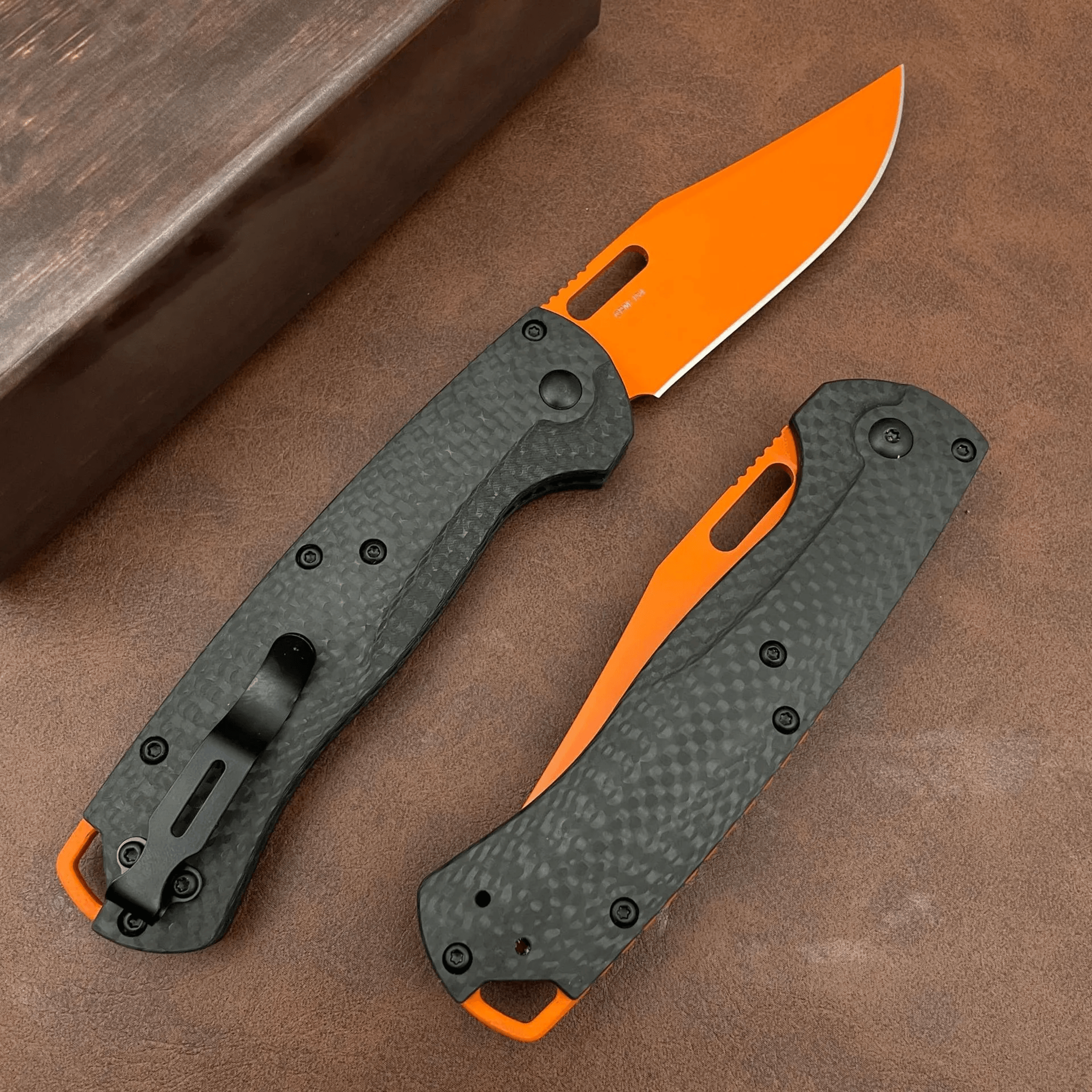 folding knife with point blade and carbon fiber handle