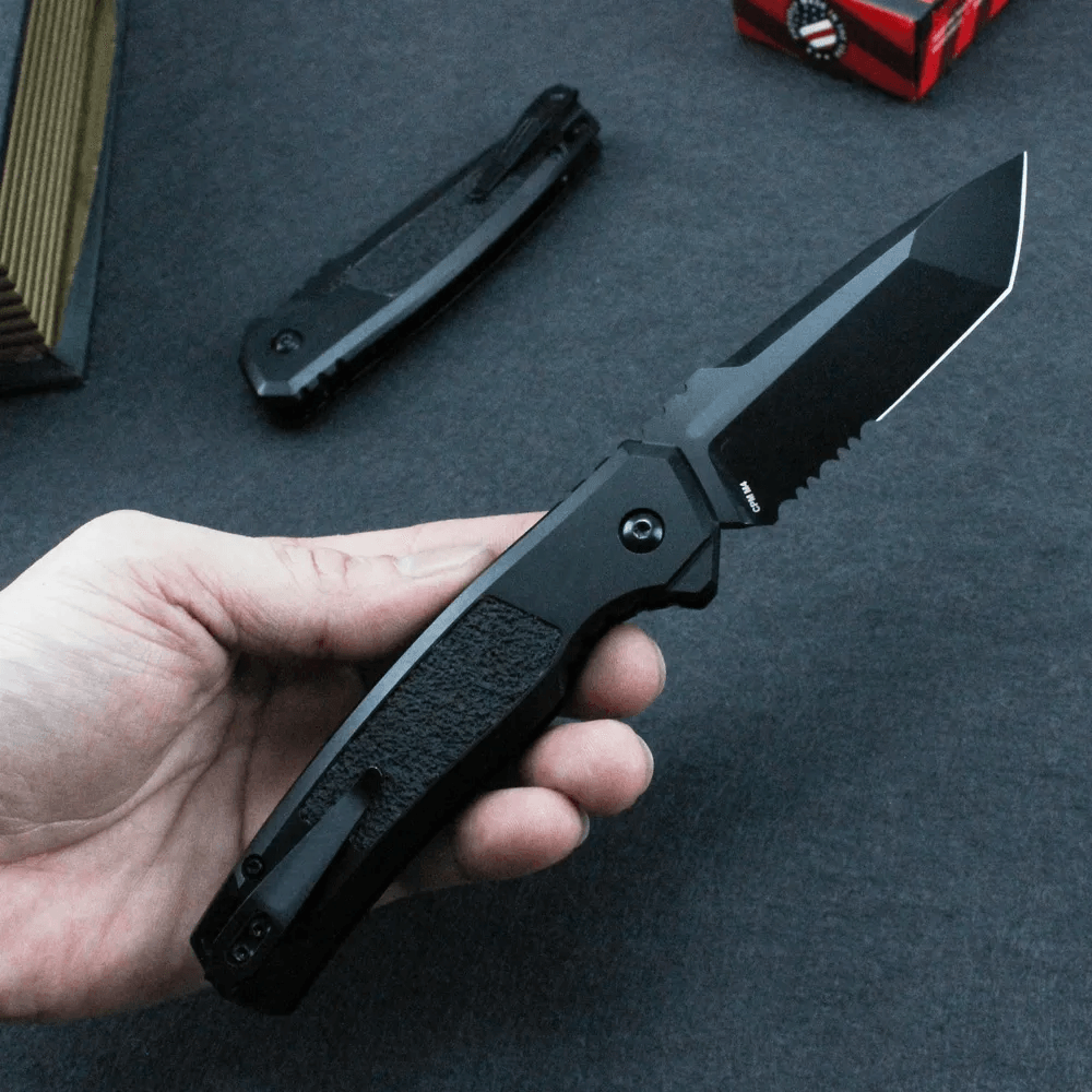 tactical knife with titanium coated serrated blade and cnc aluminum handle