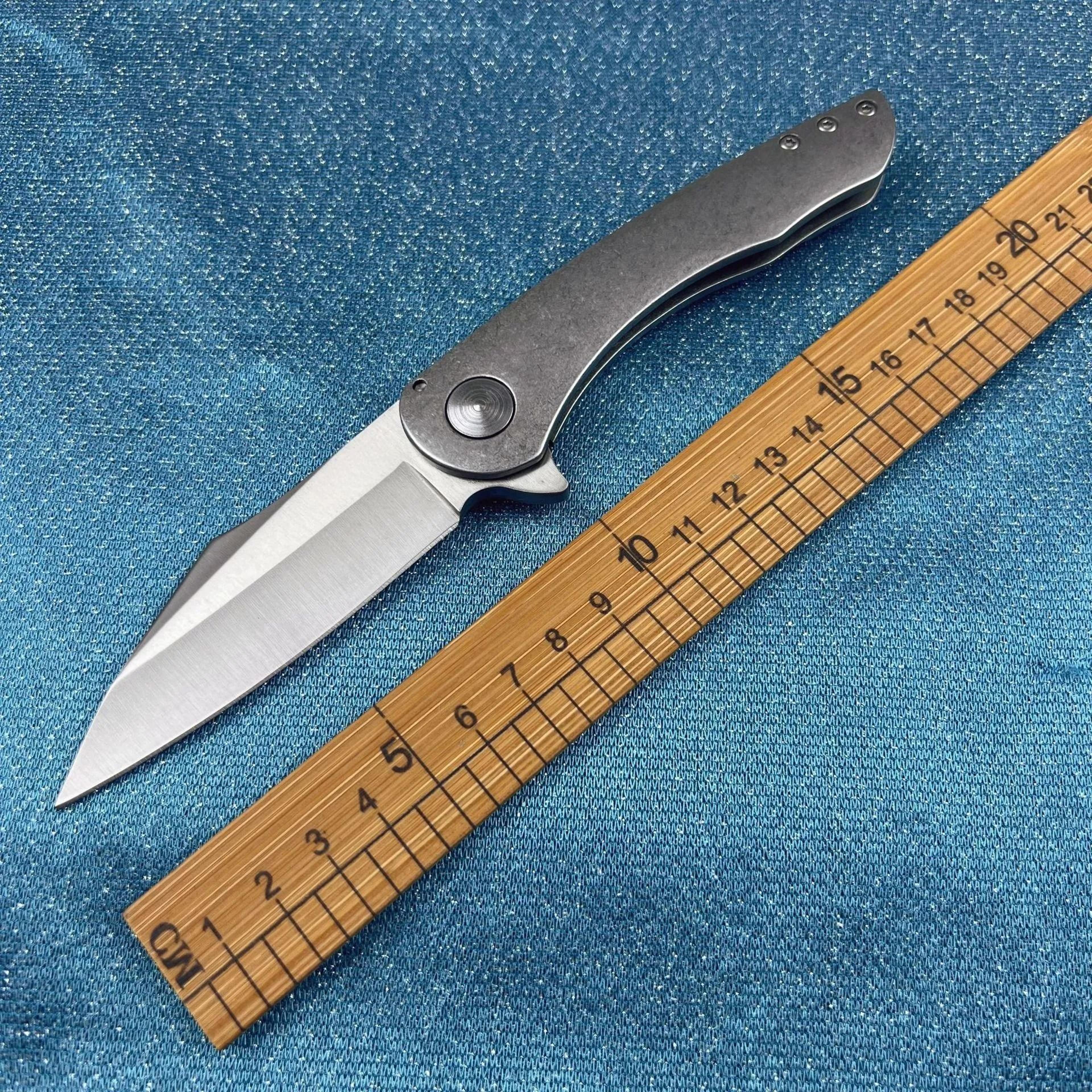 folding tanto pocket knife with stainless steel blade and ball bearing flipper