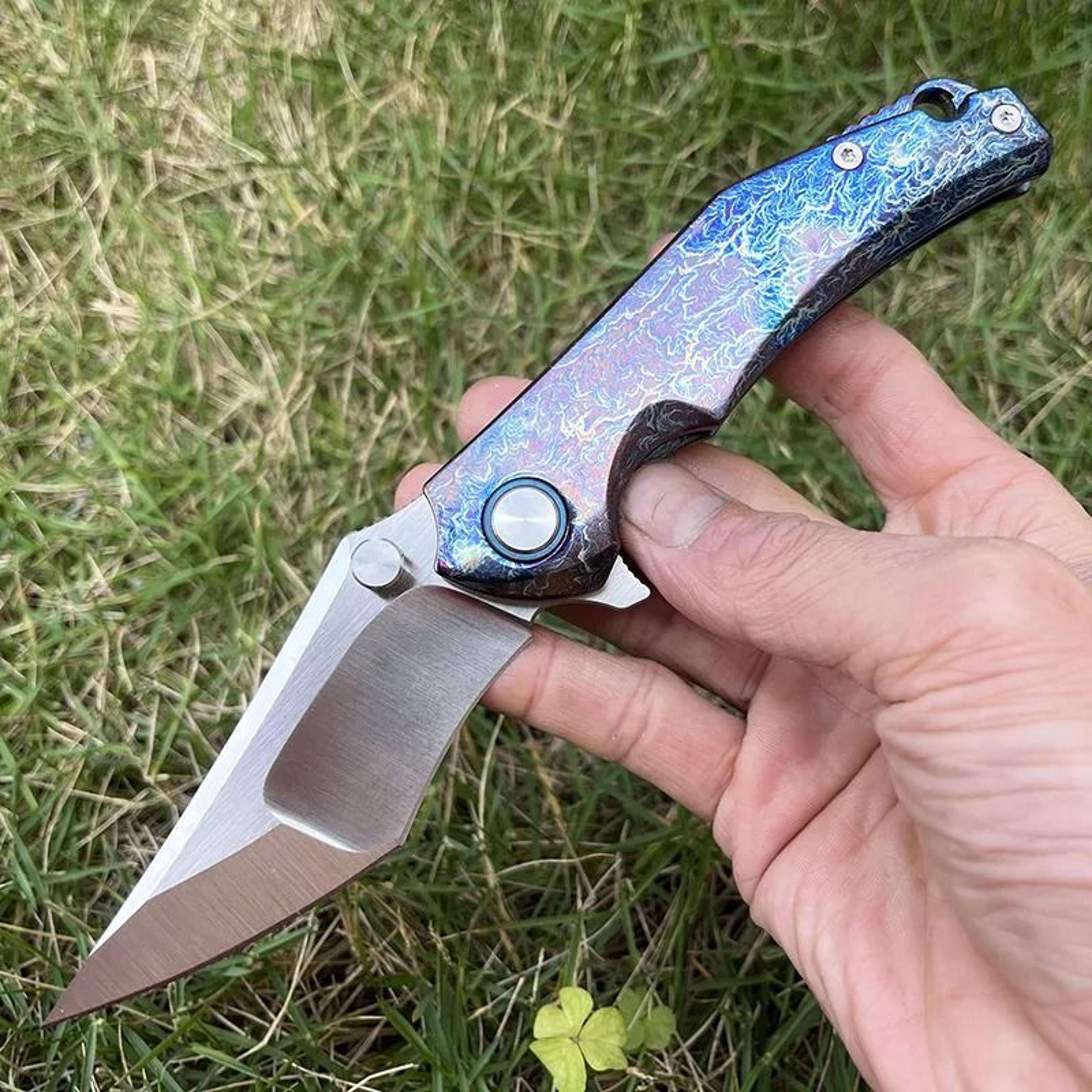 tanto folding pocket knife with titanium handle and ball bearing flipper