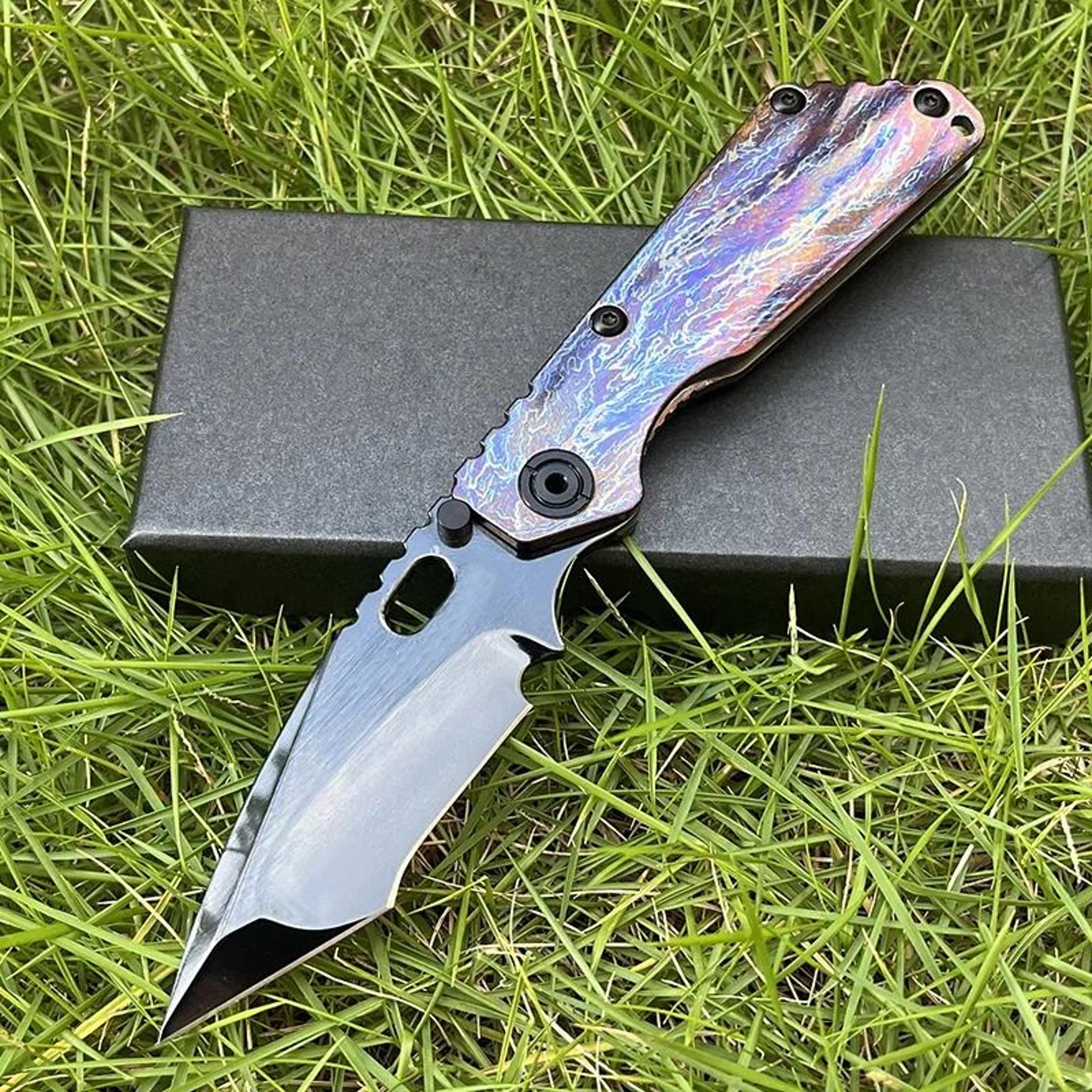 folding pocket knife with titanium alloy handle and dlc finish