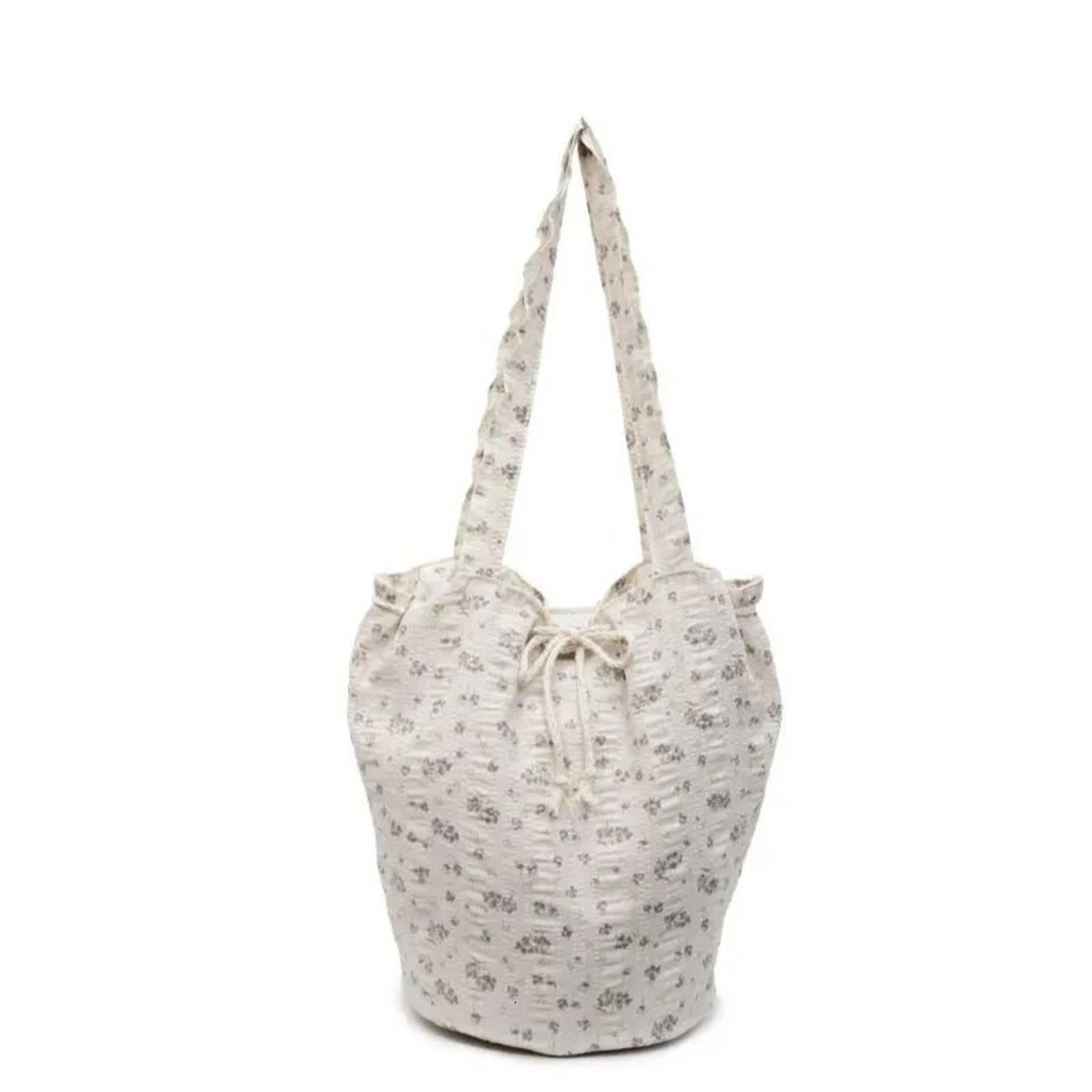 canvas crossbody bag for women with floral design and adjustable shoulder strap