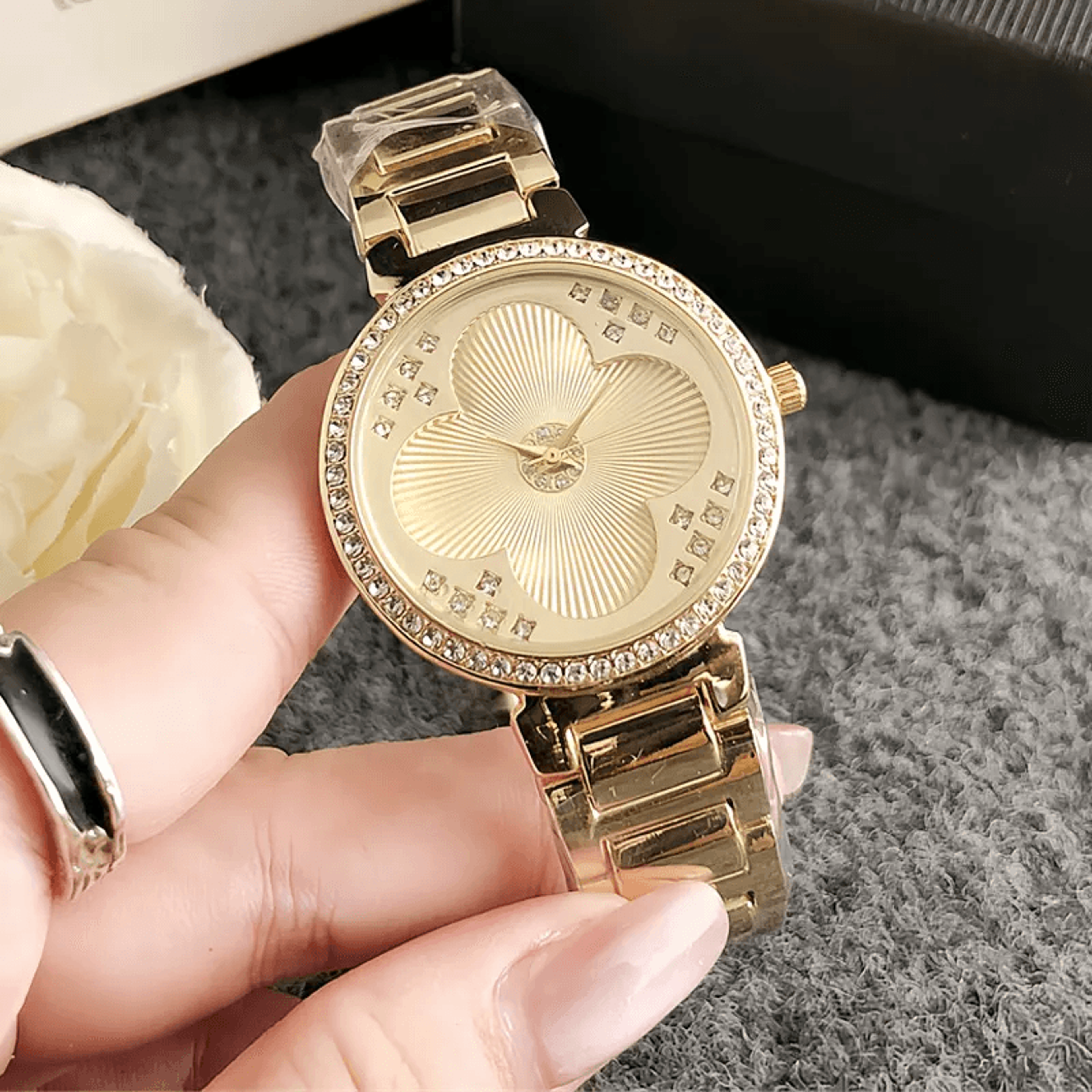 crystal quartz watch for women with stainless steel band and adjustable links