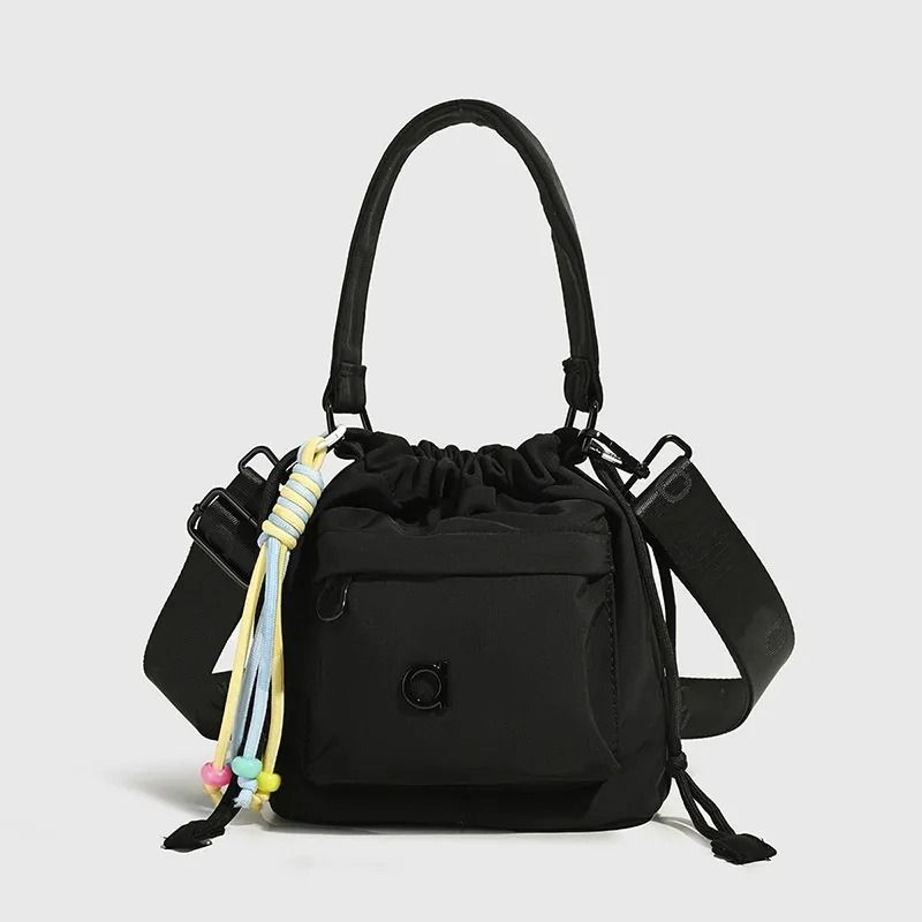 textured bucket backpack with adjustable crossbody shoulder strap