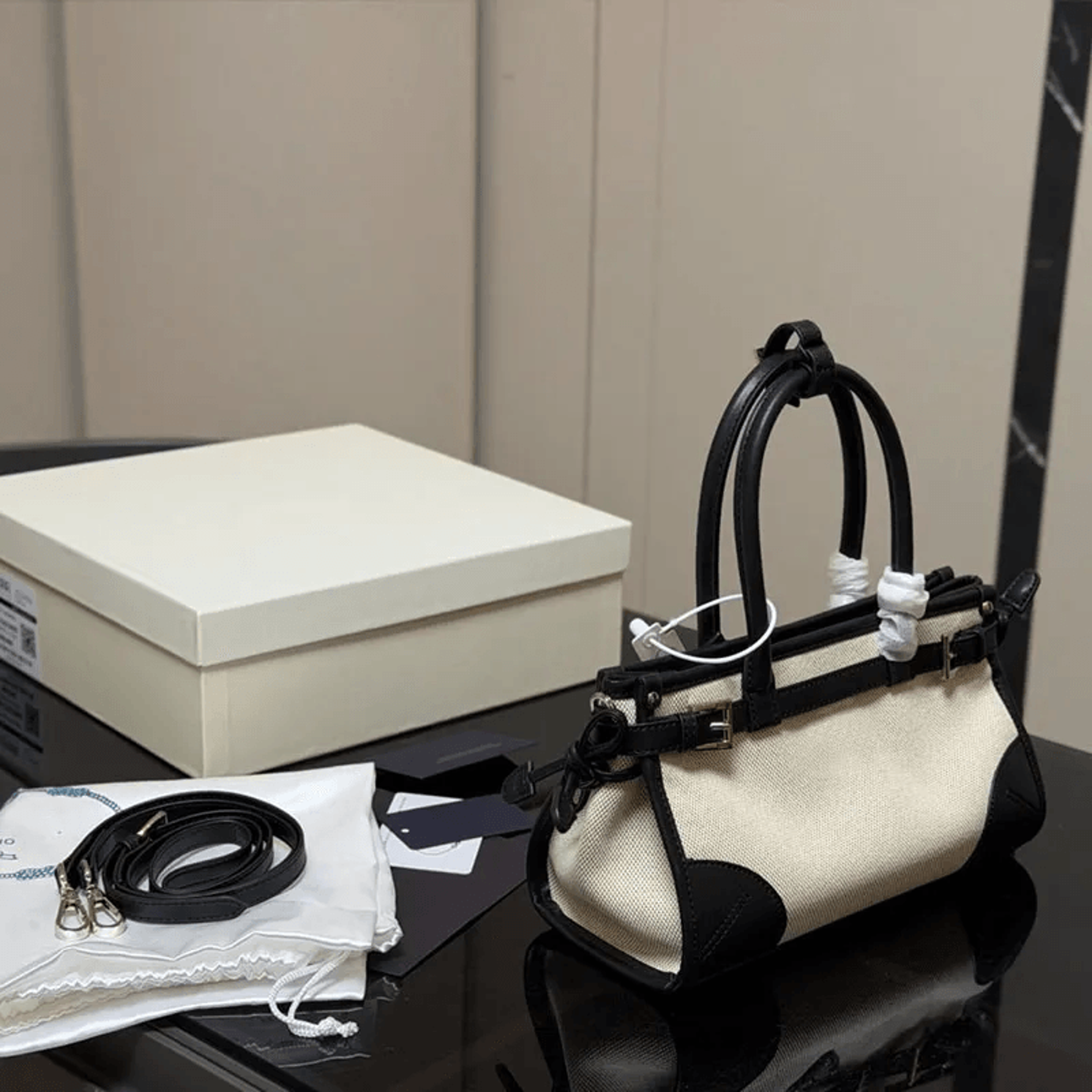 canvas and cow leather mini handbag with adjustable crossbody strap