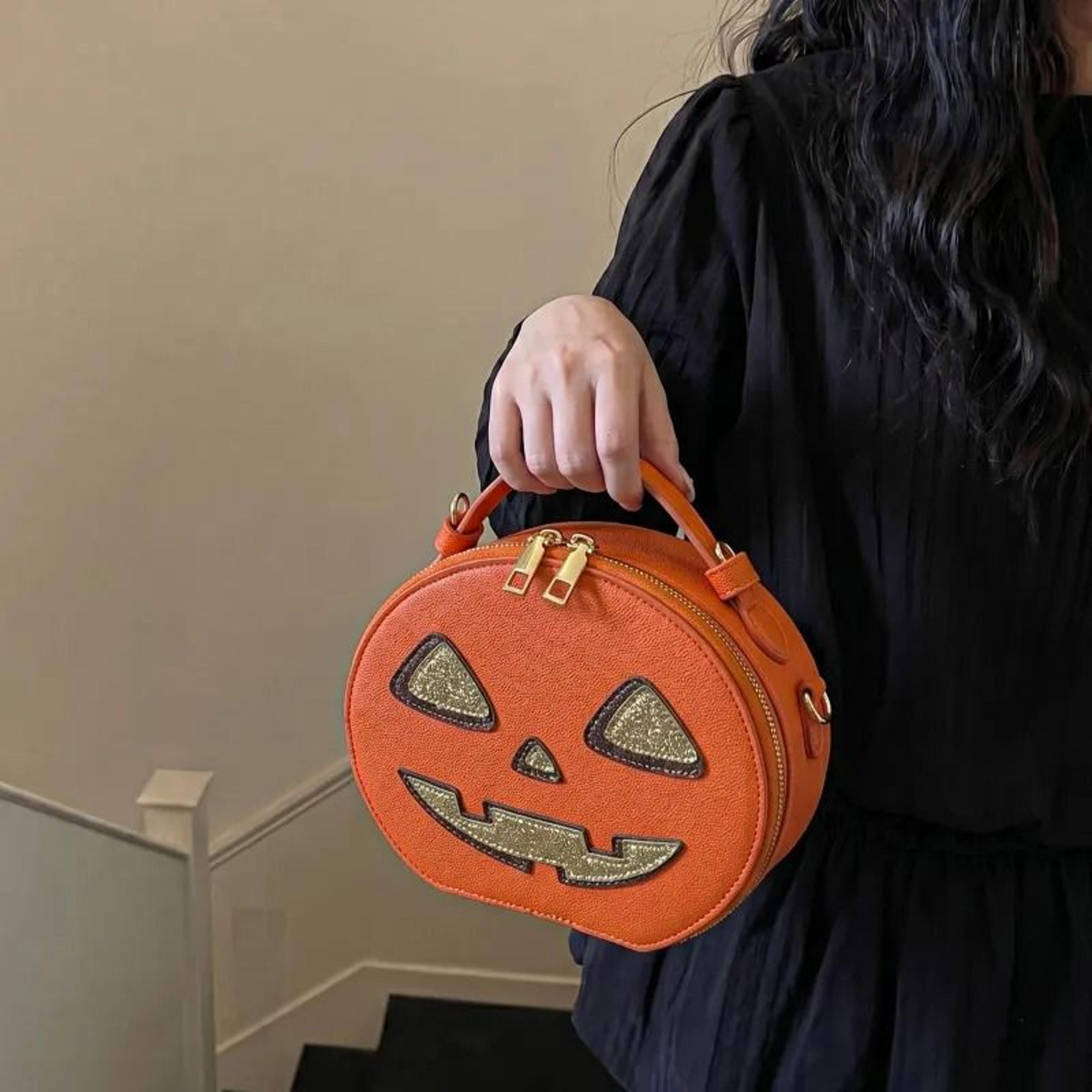 halloween pumpkin crossbody bag with adjustable strap and round design