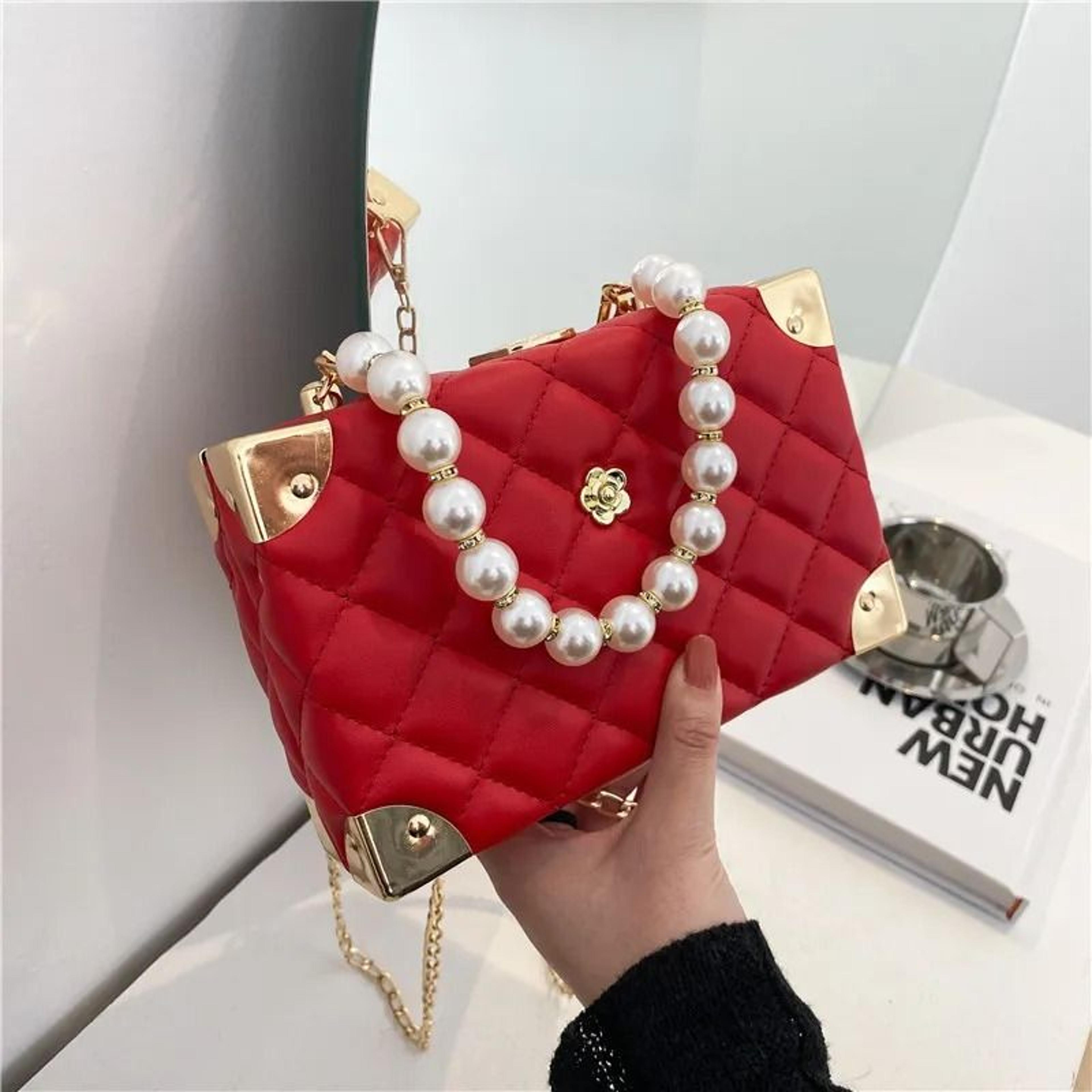 quilted pearl chain crossbody bag with embroidered top handle