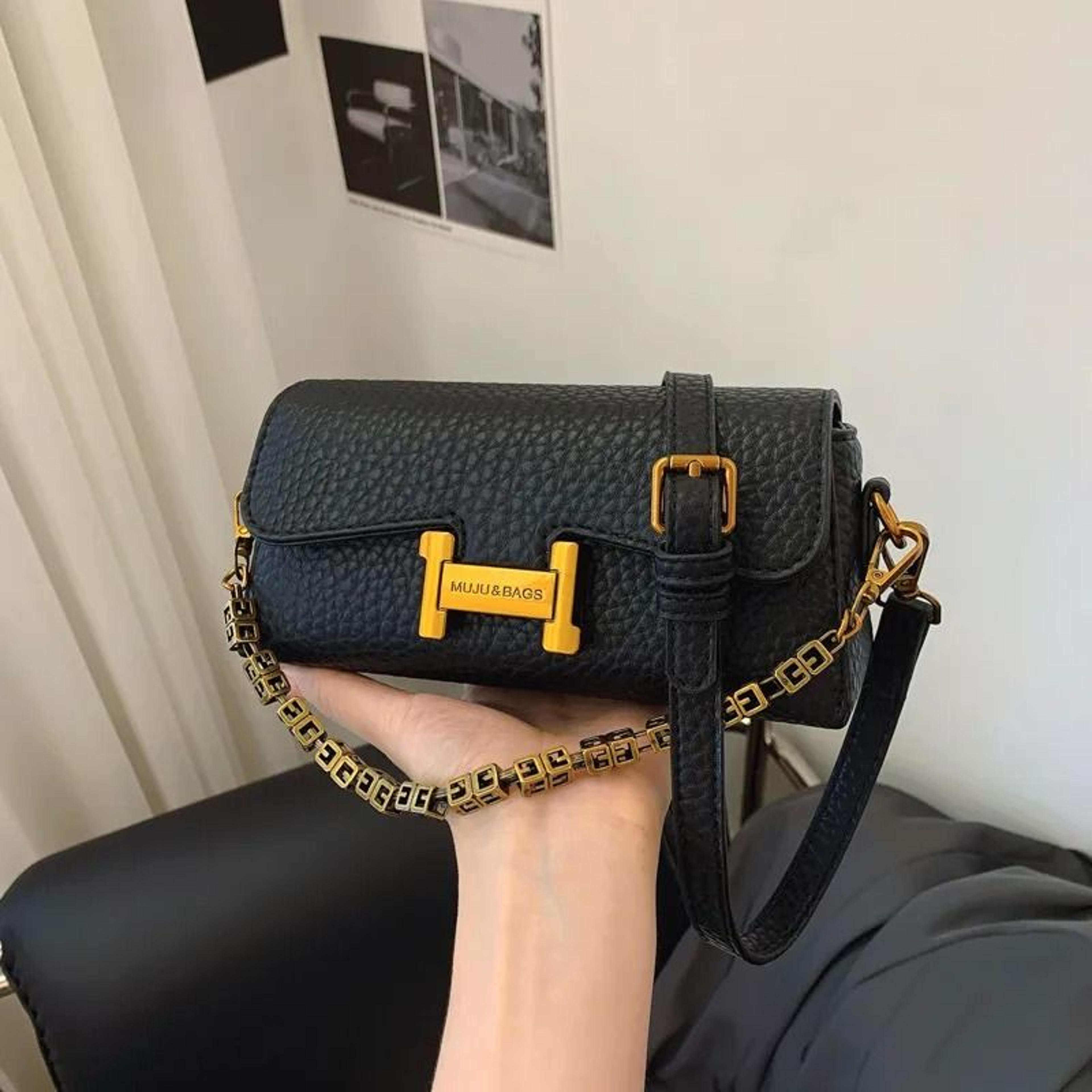 buckle flap crossbody bag with pebbled pu leather and gold chain