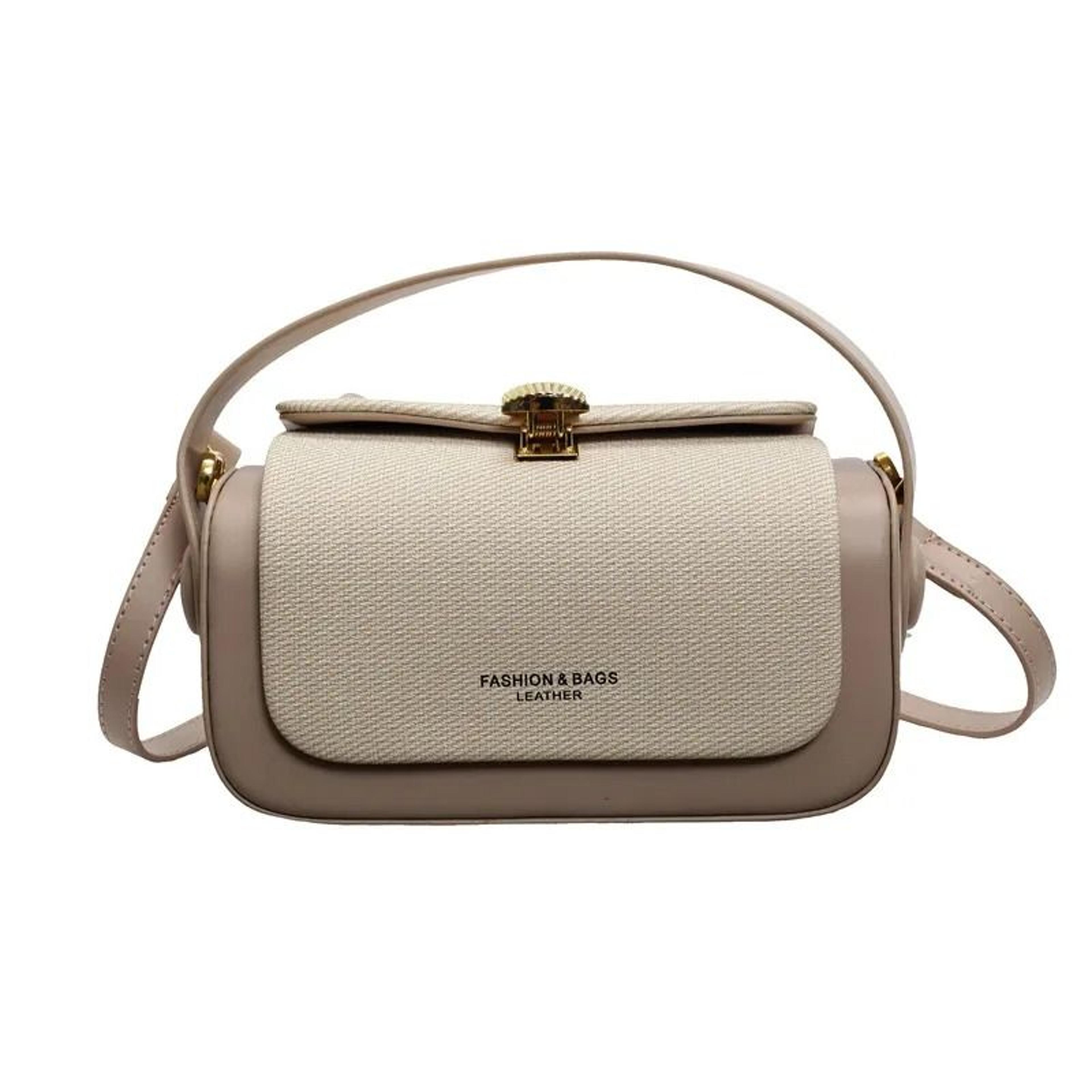 vintage box crossbody bag with adjustable strap and magnetic flap closure