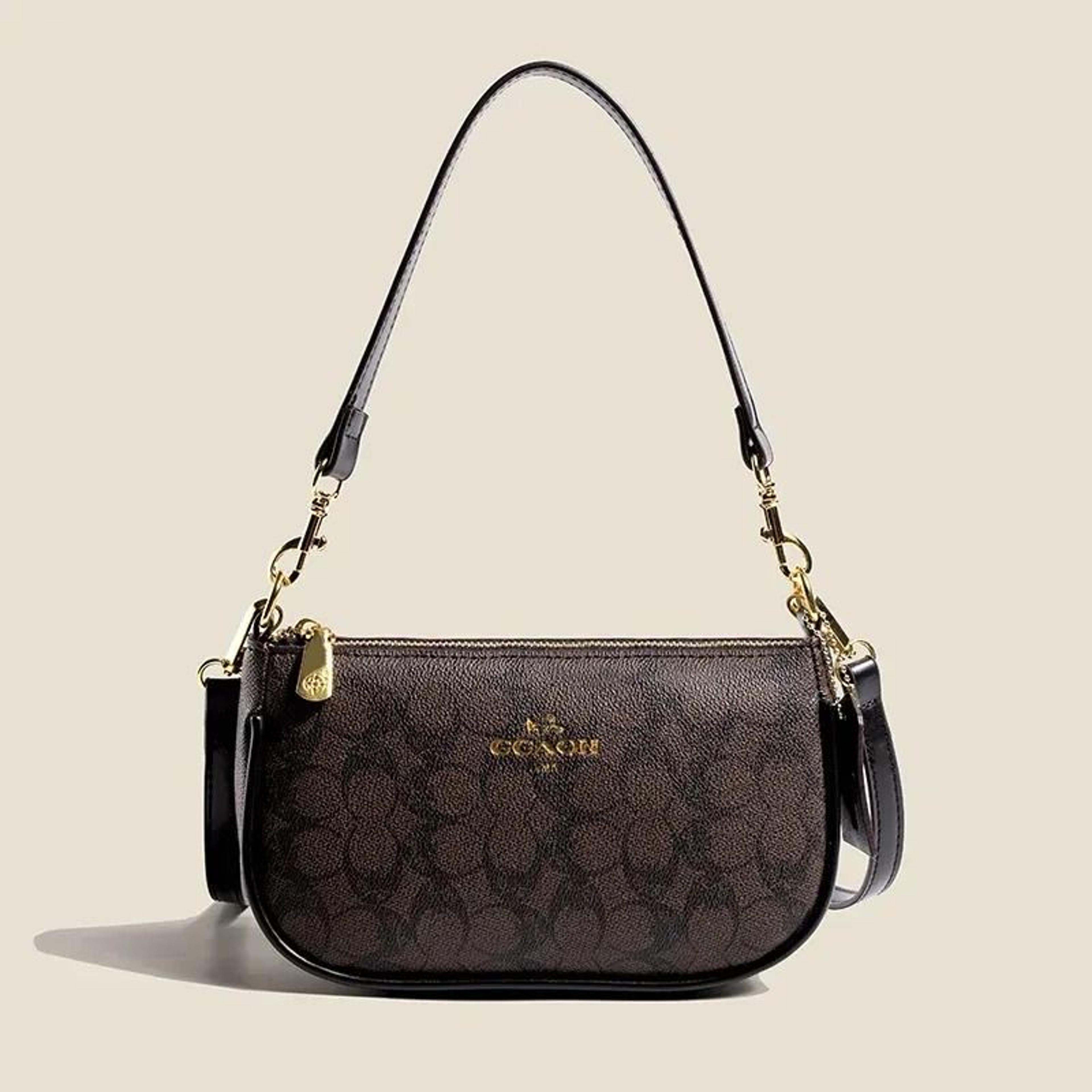 women printed shoulder bag with zipper closure in brown and black