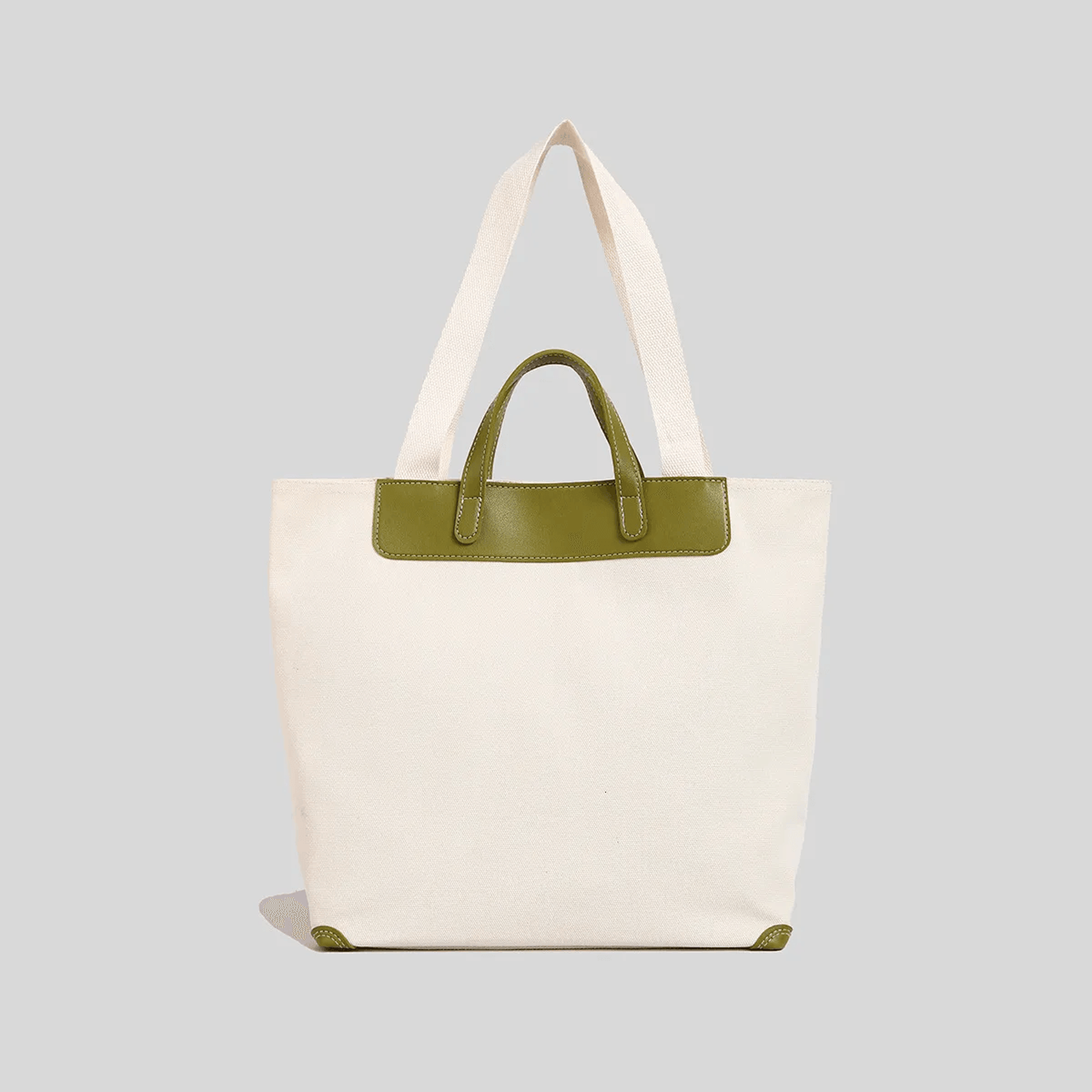 women's large capacity canvas tote bag with leather accents for work and commuting
