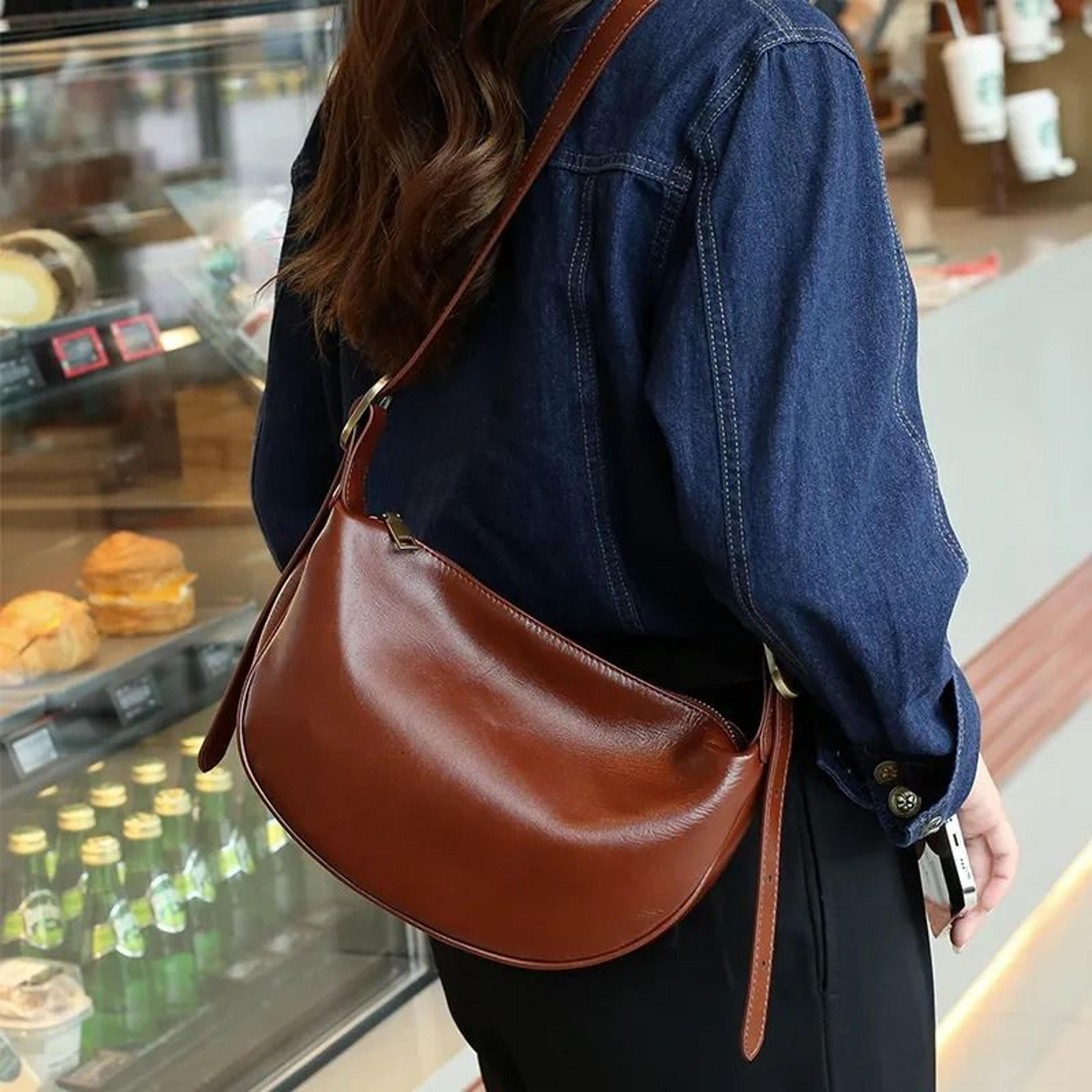 women vintage dumpling crossbody bag with adjustable shoulder strap