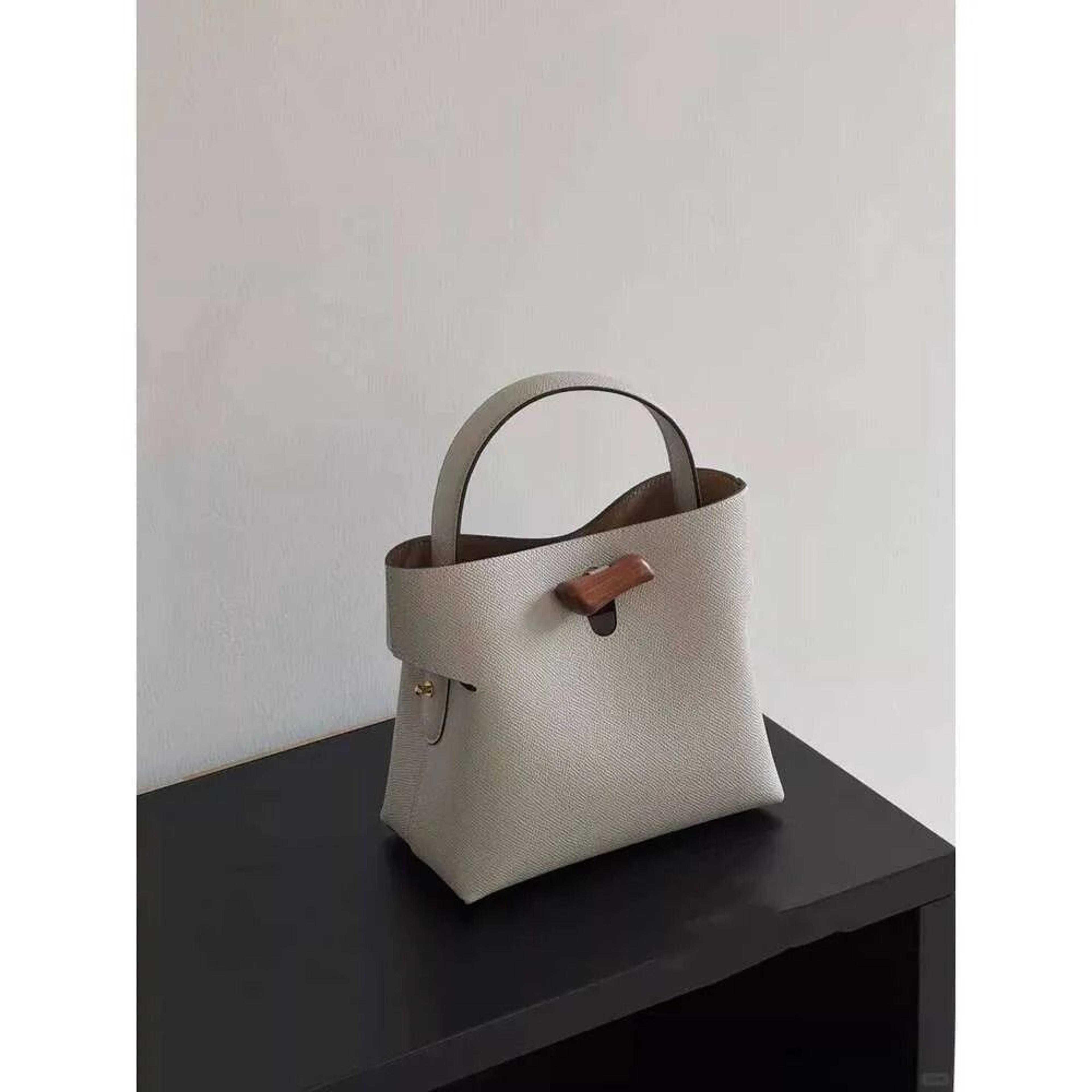 women palm print shoulder bucket bag with adjustable strap
