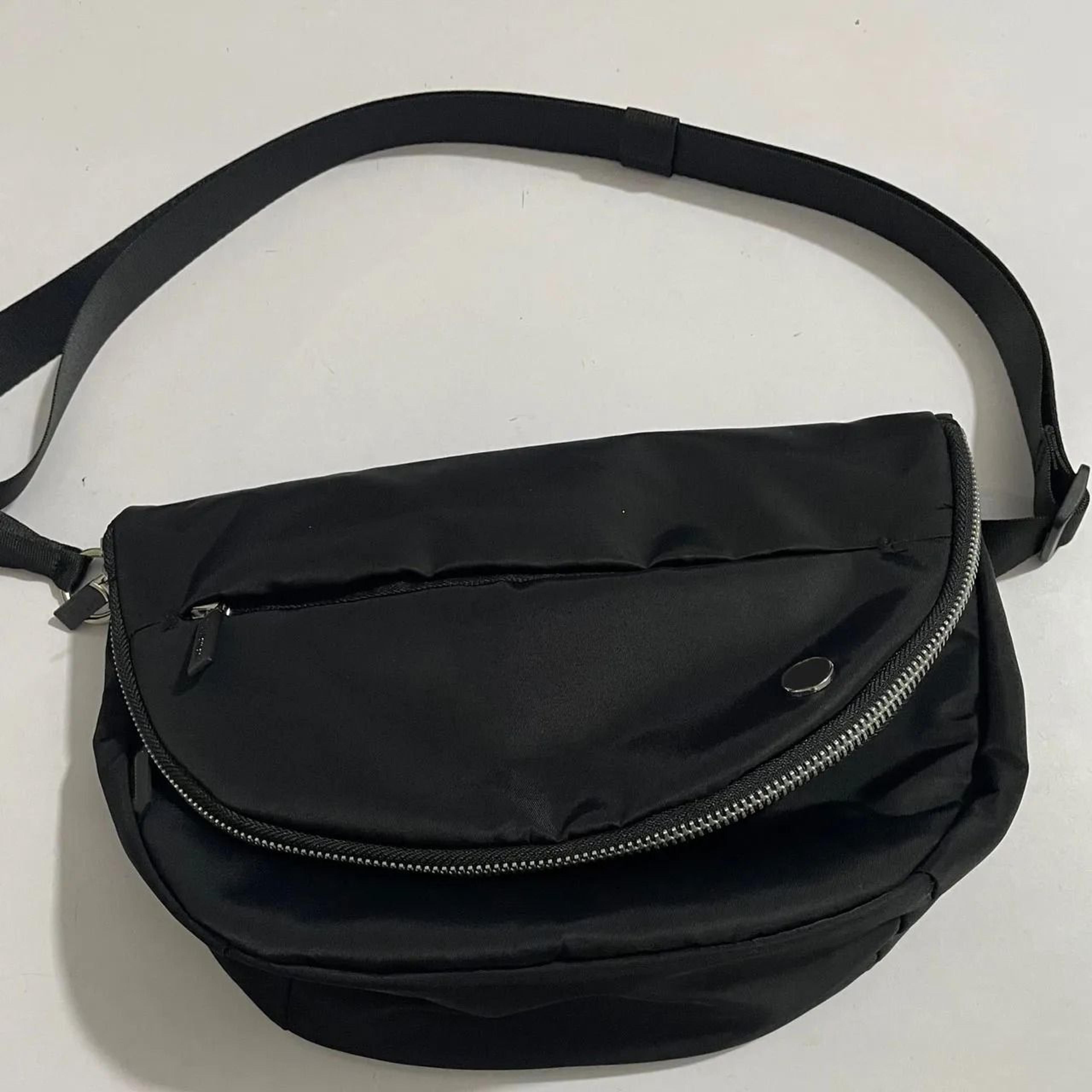 water-repellent crossbody festival bag with adjustable strap