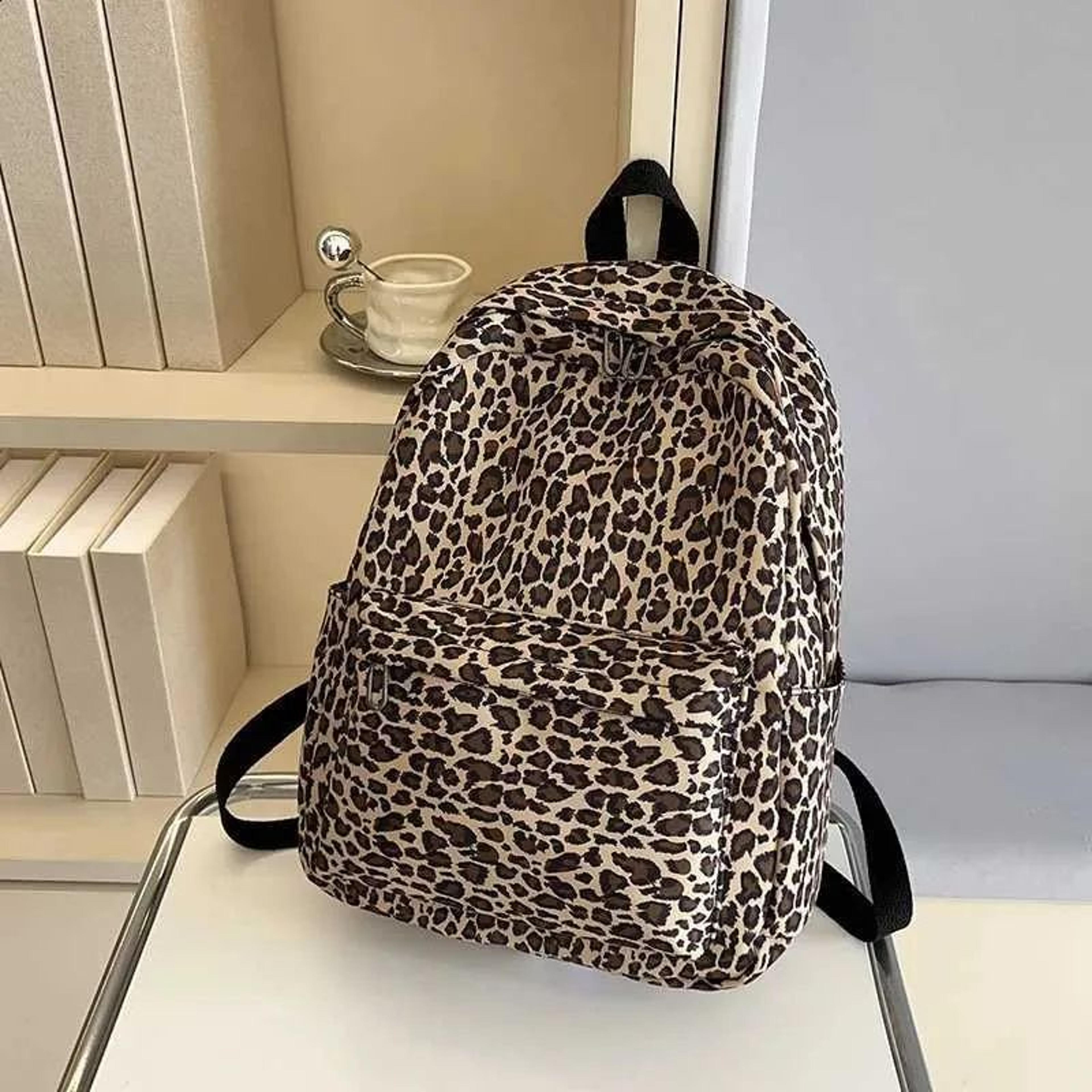 leopard print backpack with large capacity for school and travel