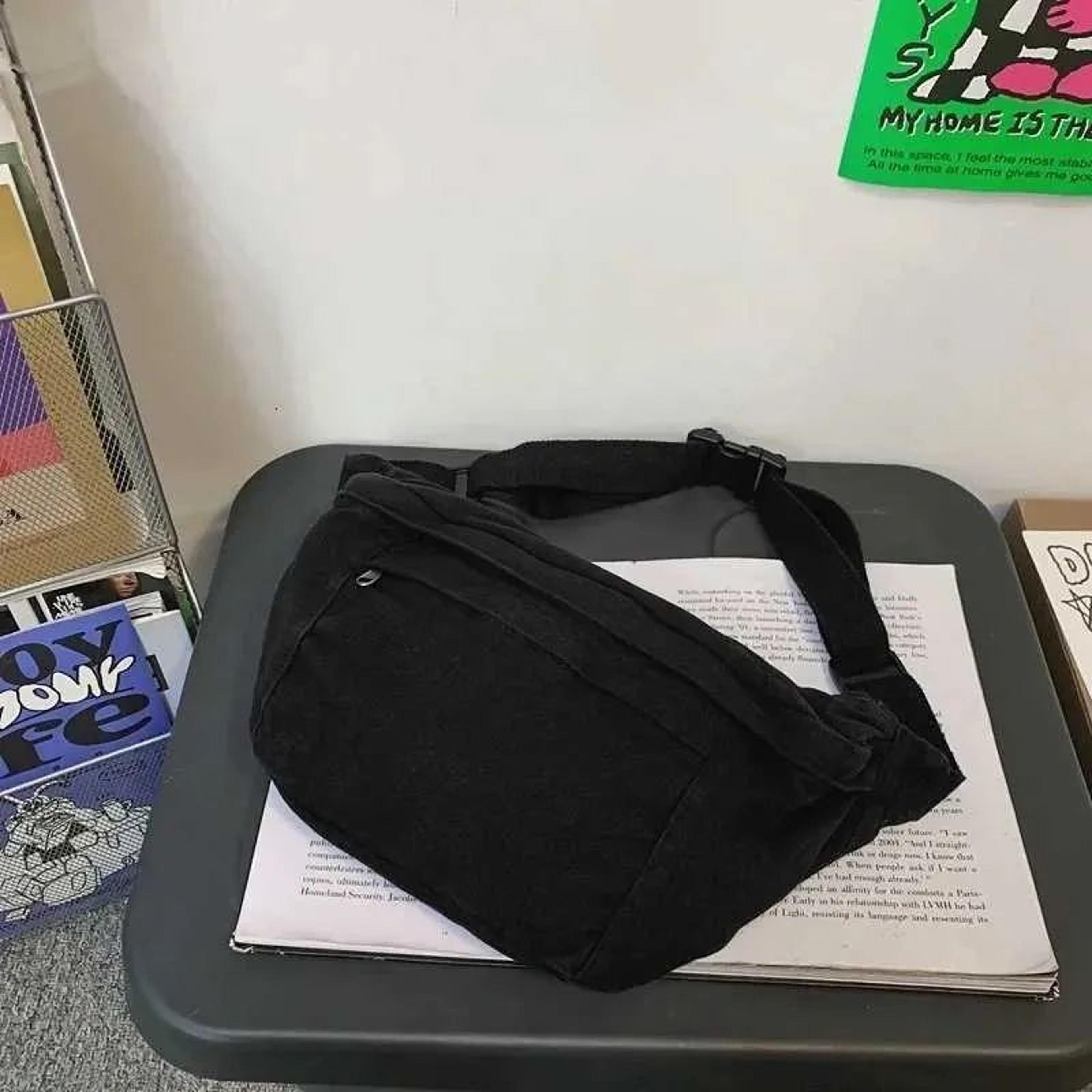 unisex canvas waist bag with wide strap and chain detail for streetwear