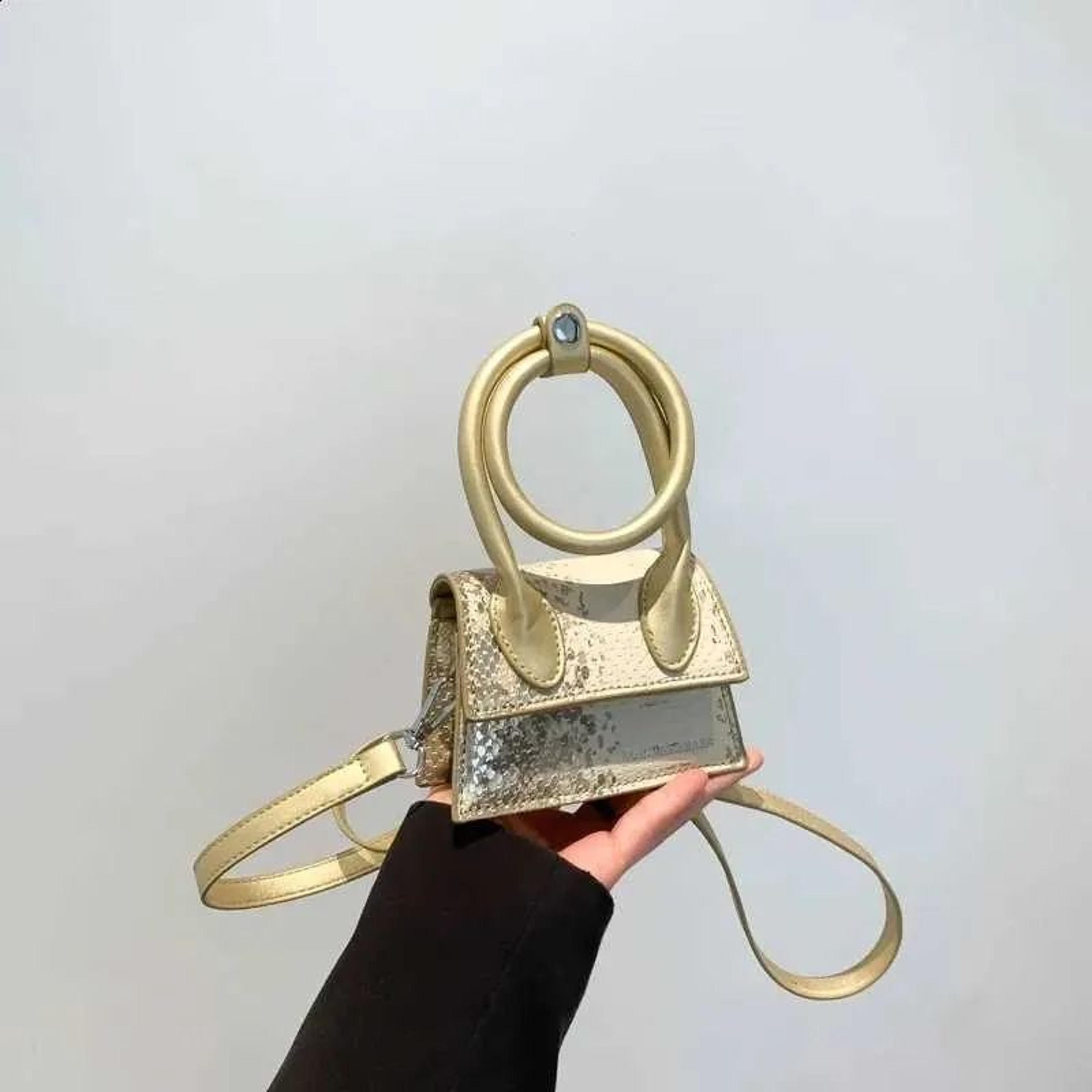 womens silver crossbody bag with mini coin purse and gold accents