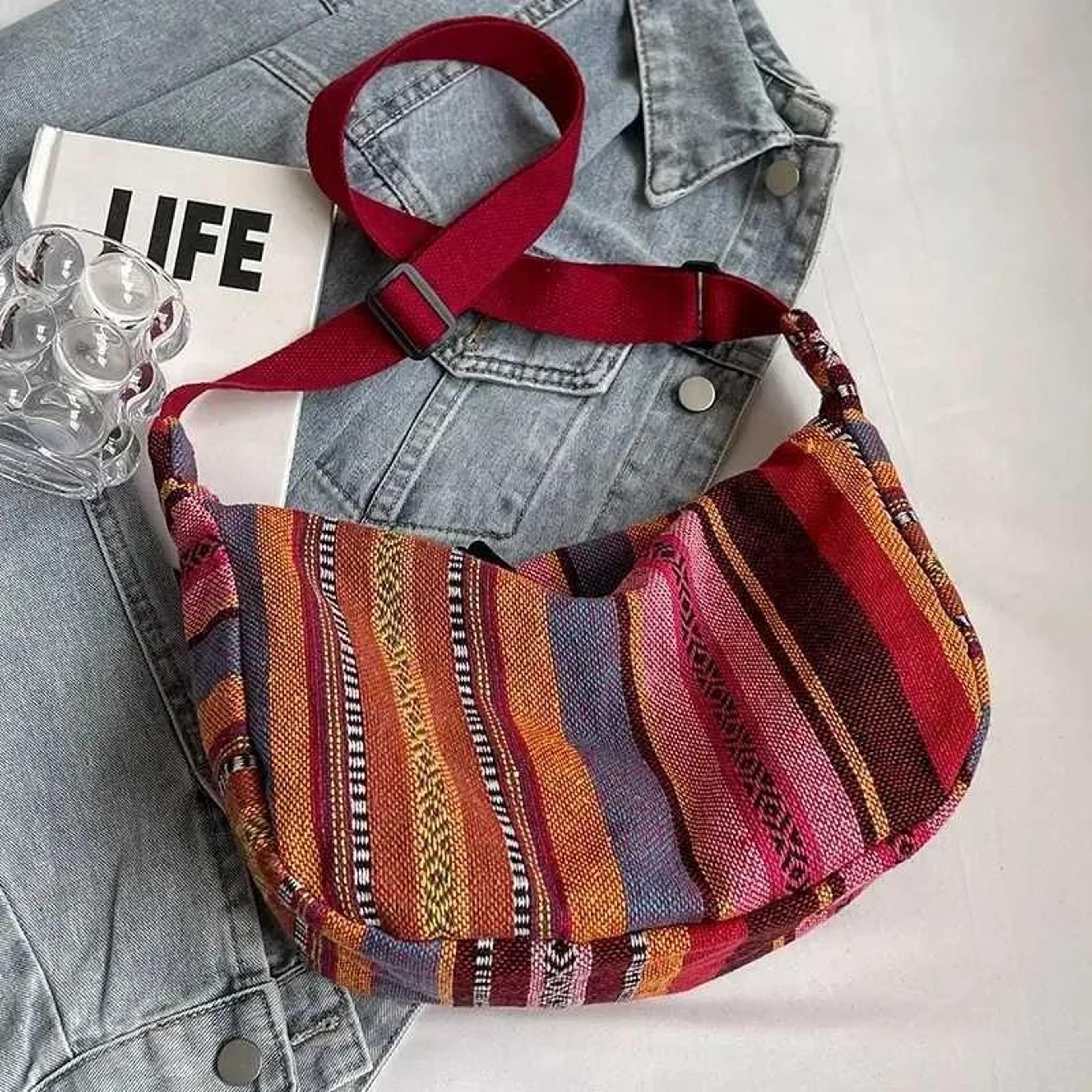 tribal style canvas crossbody shoulder bag with striped pattern and zipper closure