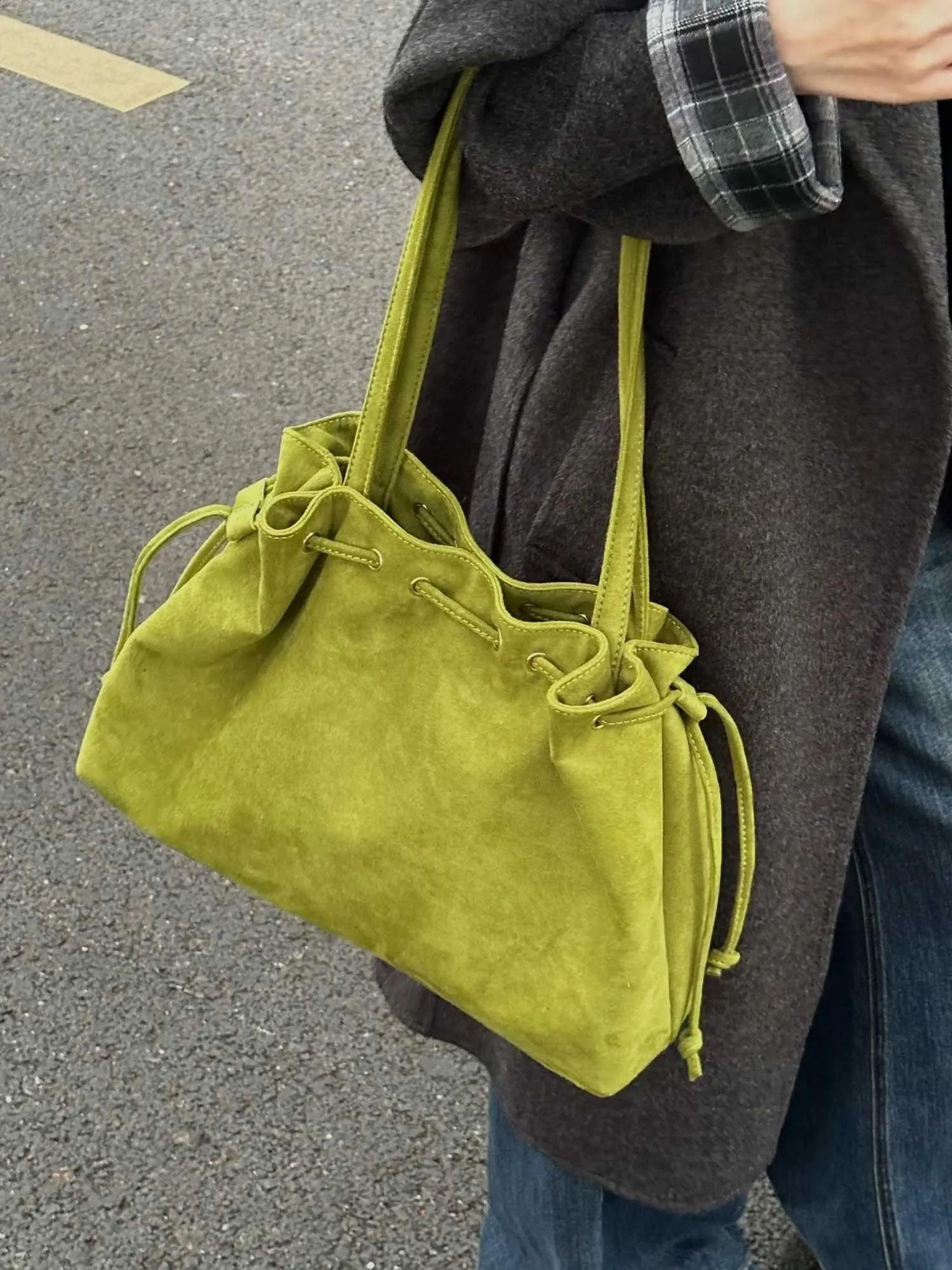 women vintage faux suede tote bag with drawstring closure in frosted green