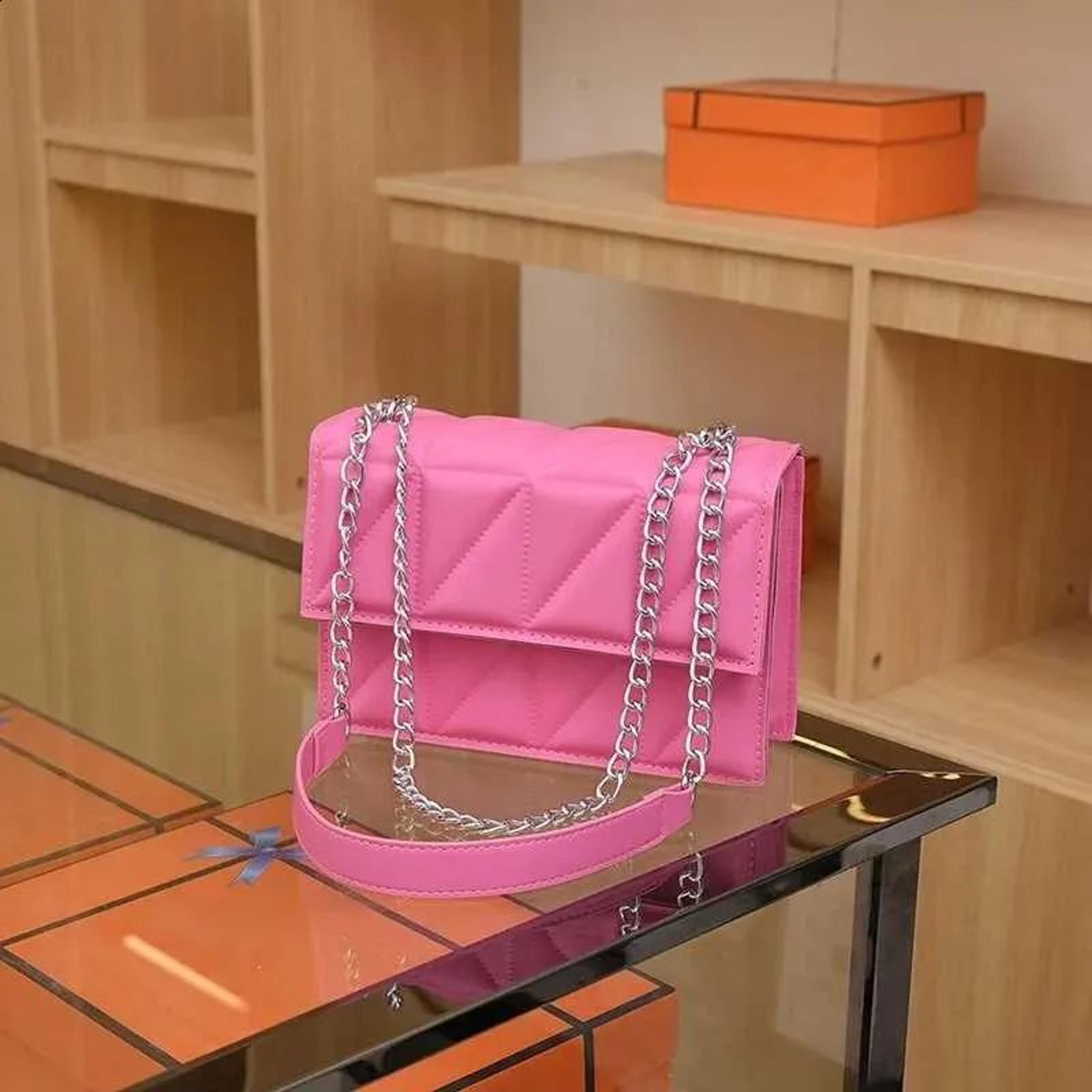 womens quilted chain shoulder bag with classic flap crossbody design