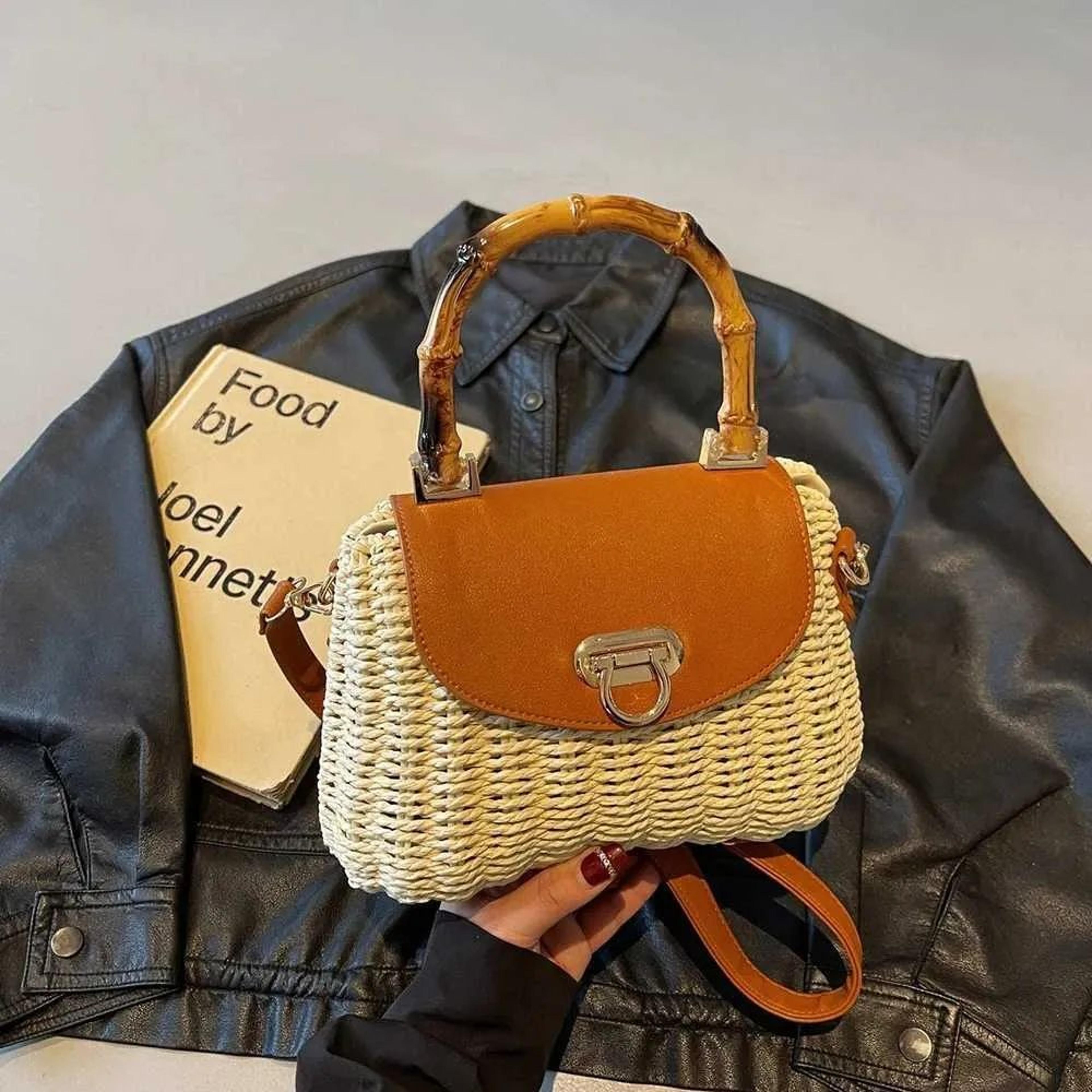 womens woven straw crossbody bag with trapezoid shape and flap lock