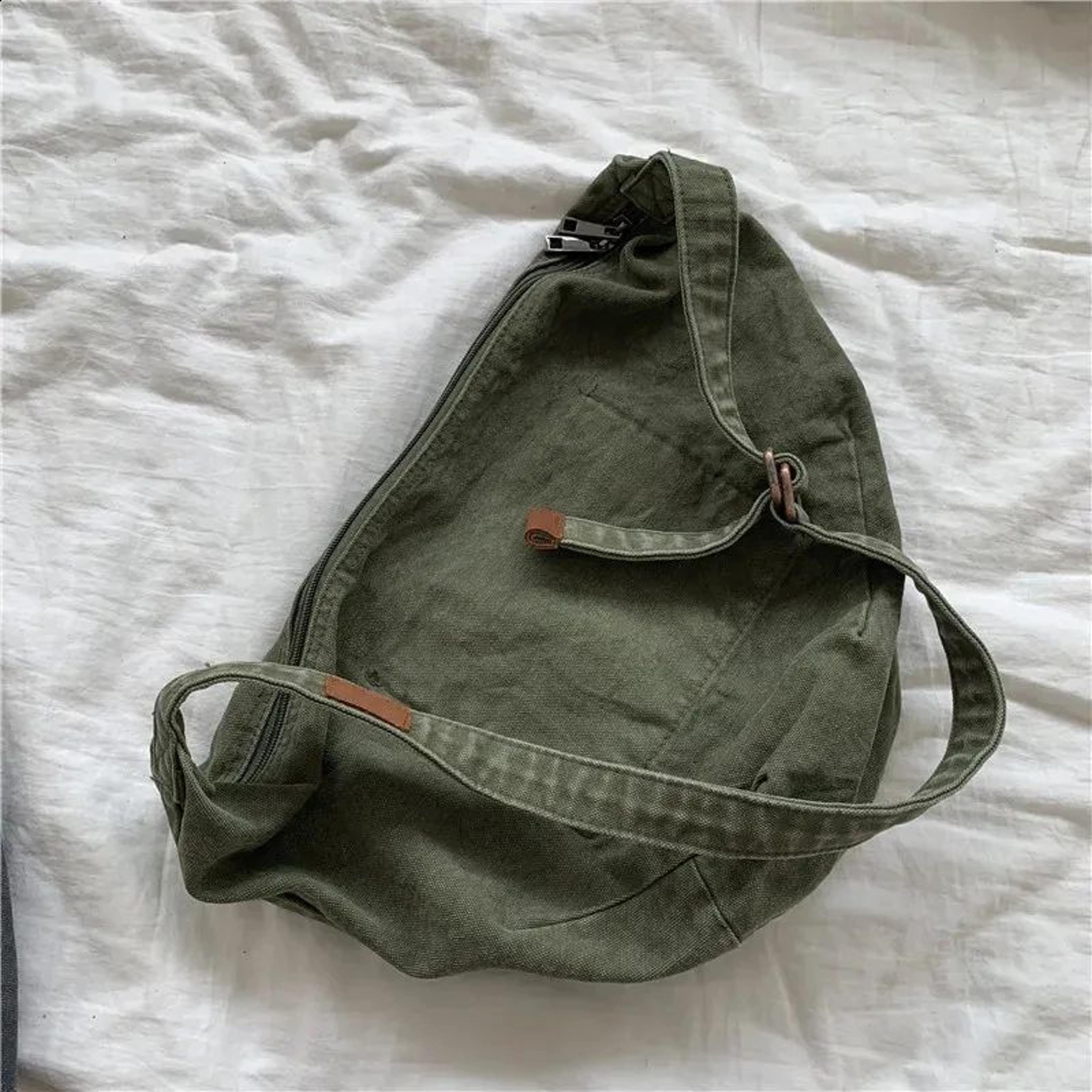 retro canvas dumpling crossbody bag for women with adjustable shoulder strap