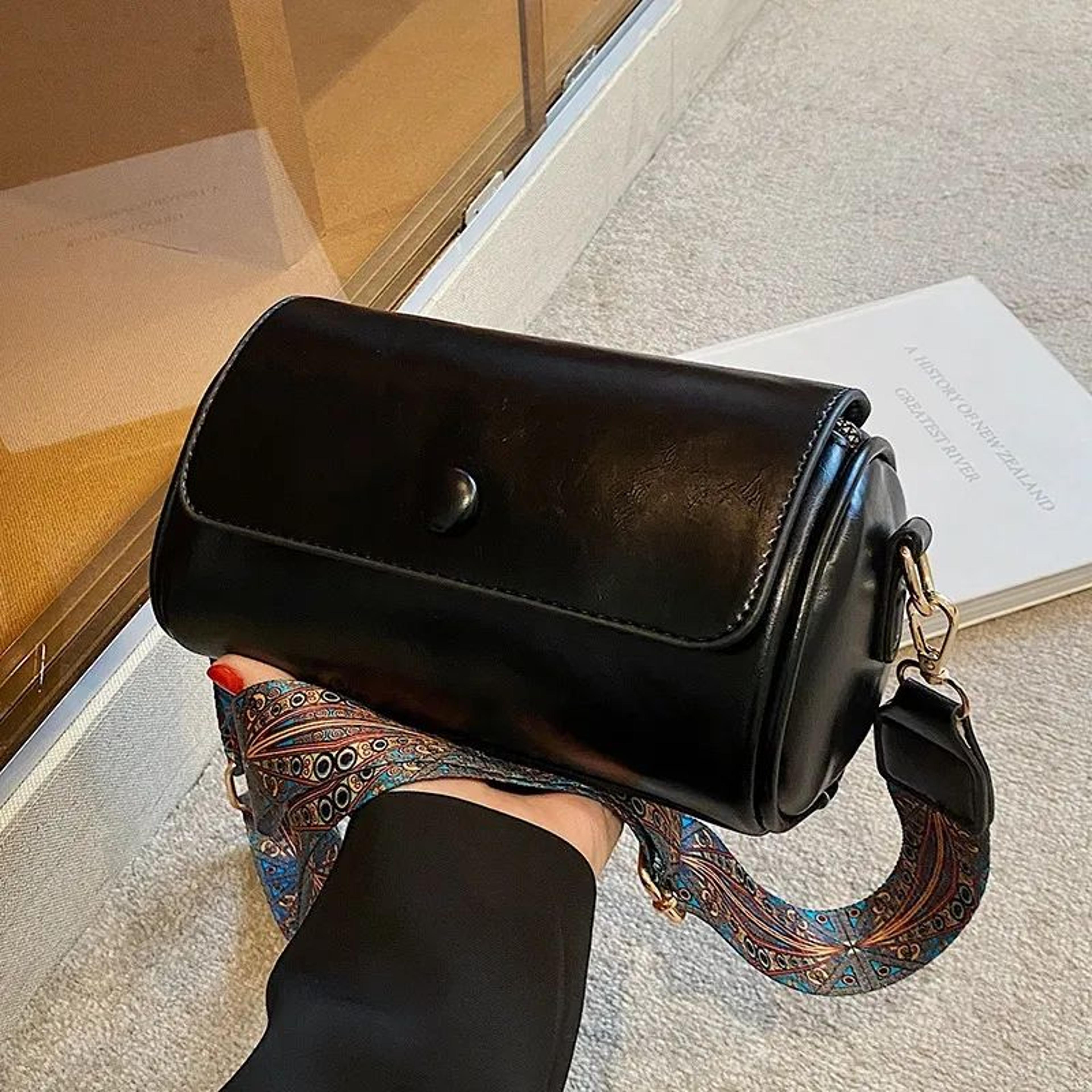womens retro cylindrical crossbody bag with wide shoulder strap
