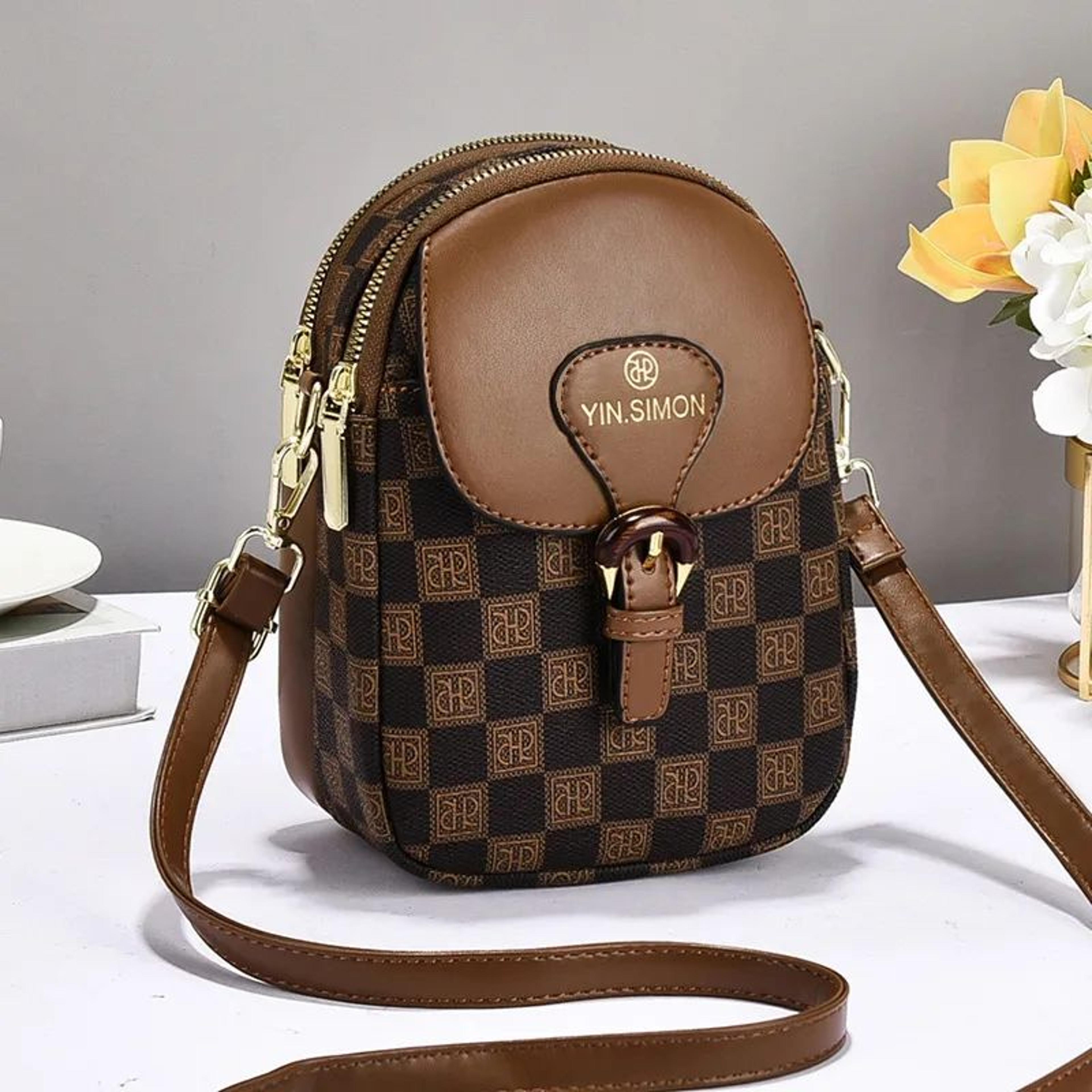 women mini leather crossbody phone bag with adjustable shoulder strap