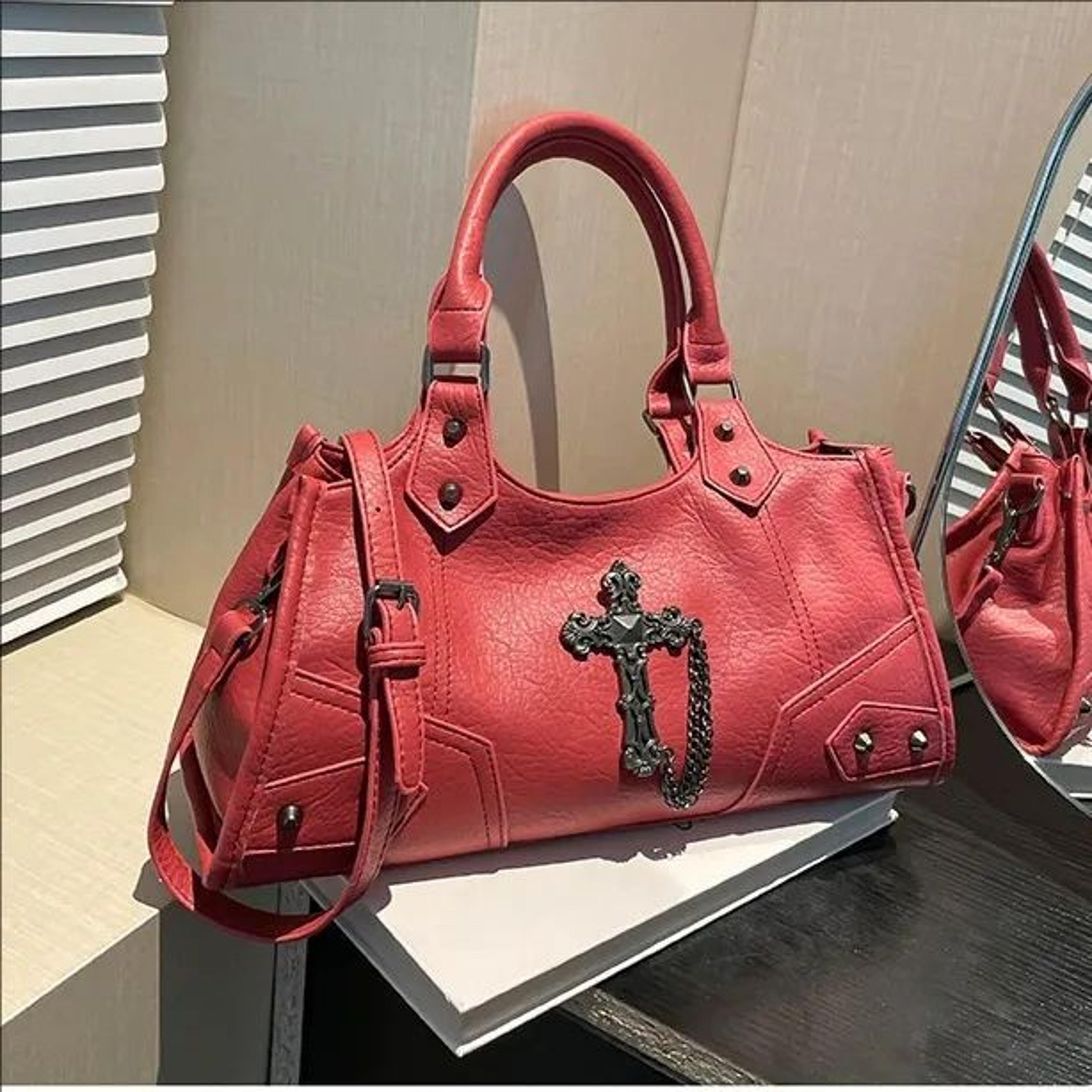womens motorcycle-inspired crossbody bag with wide shoulder strap