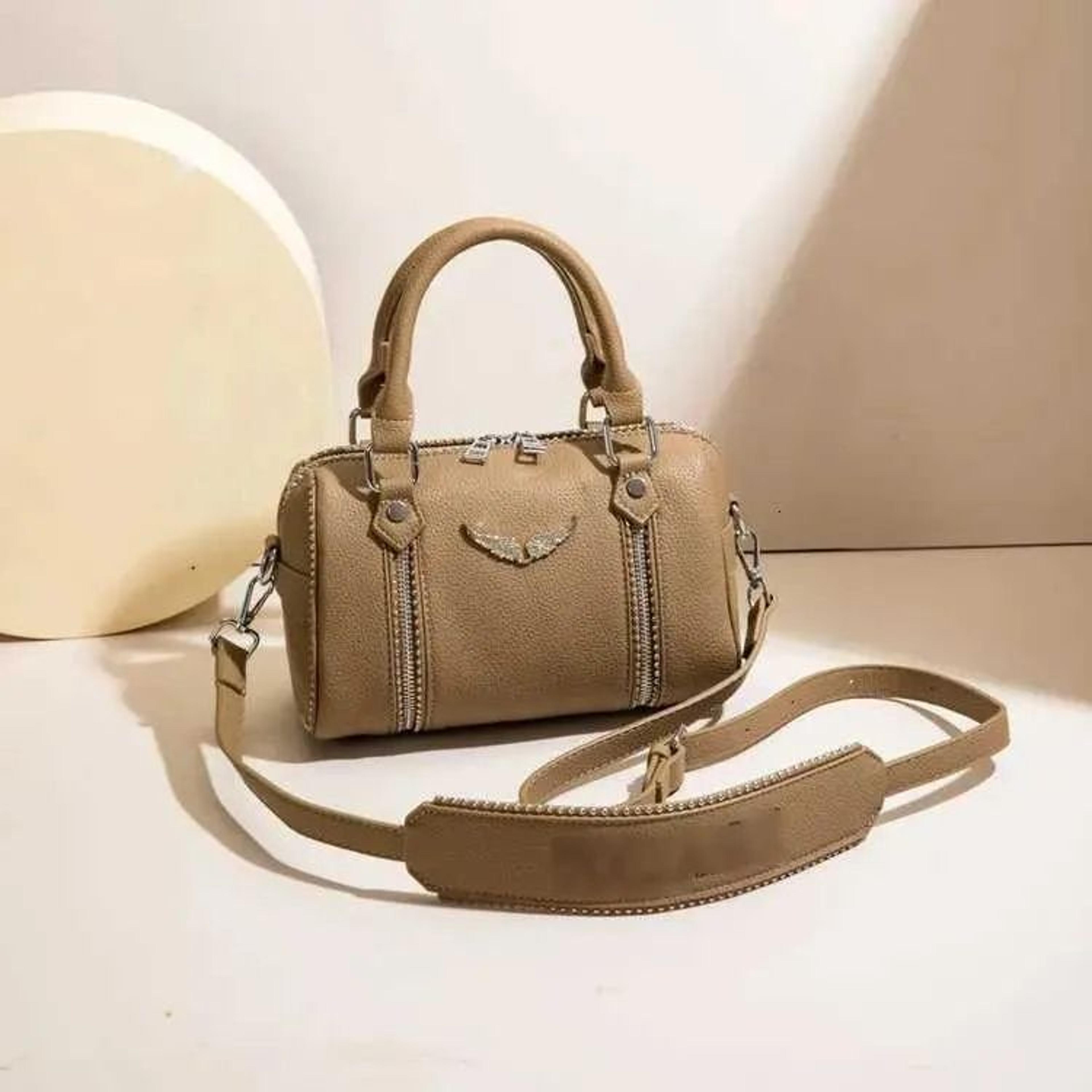 large leather diaper bag tote with crossbody and shoulder straps