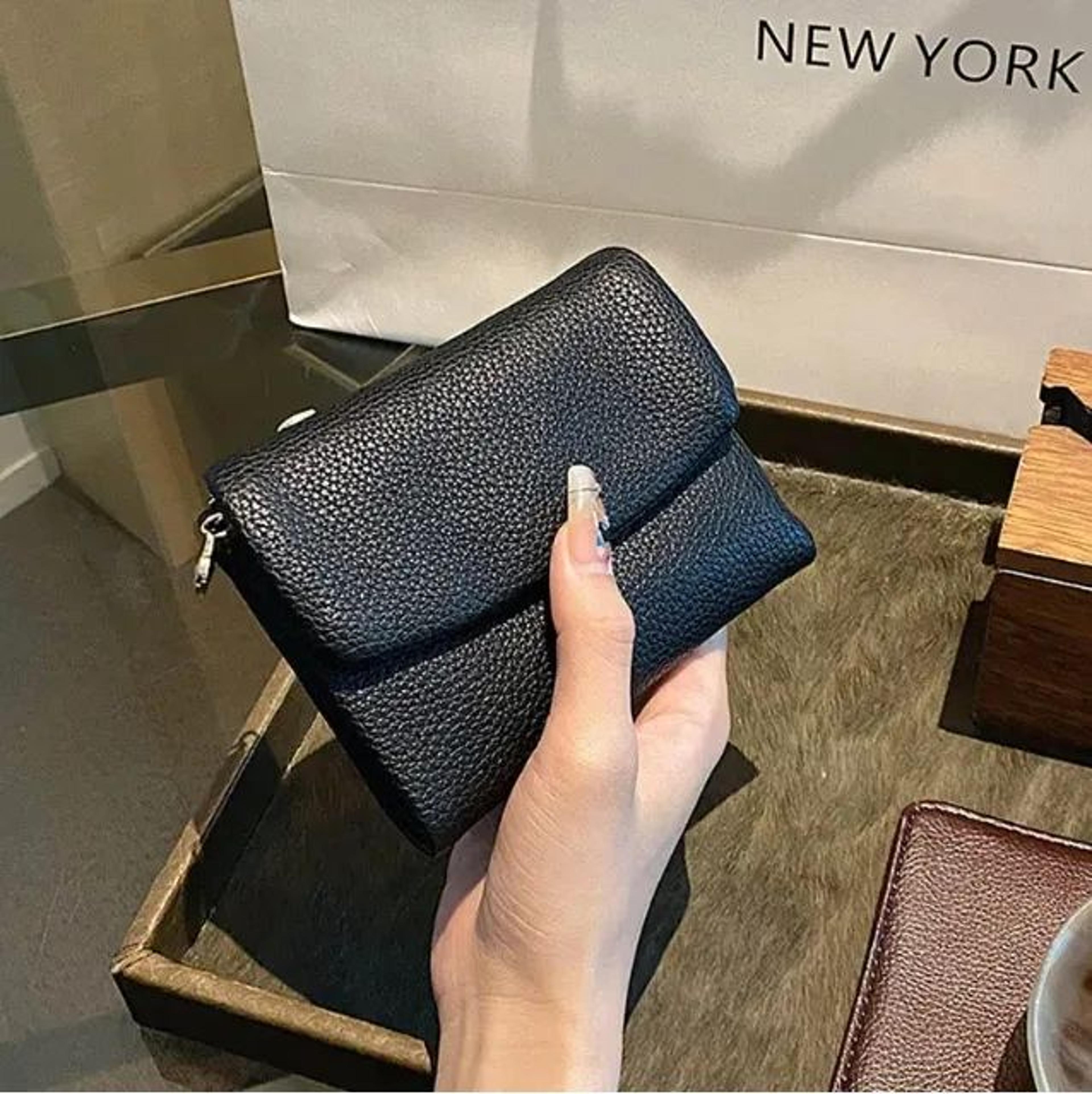 women soft leather tri-fold wallet with multiple card slots and coin storage