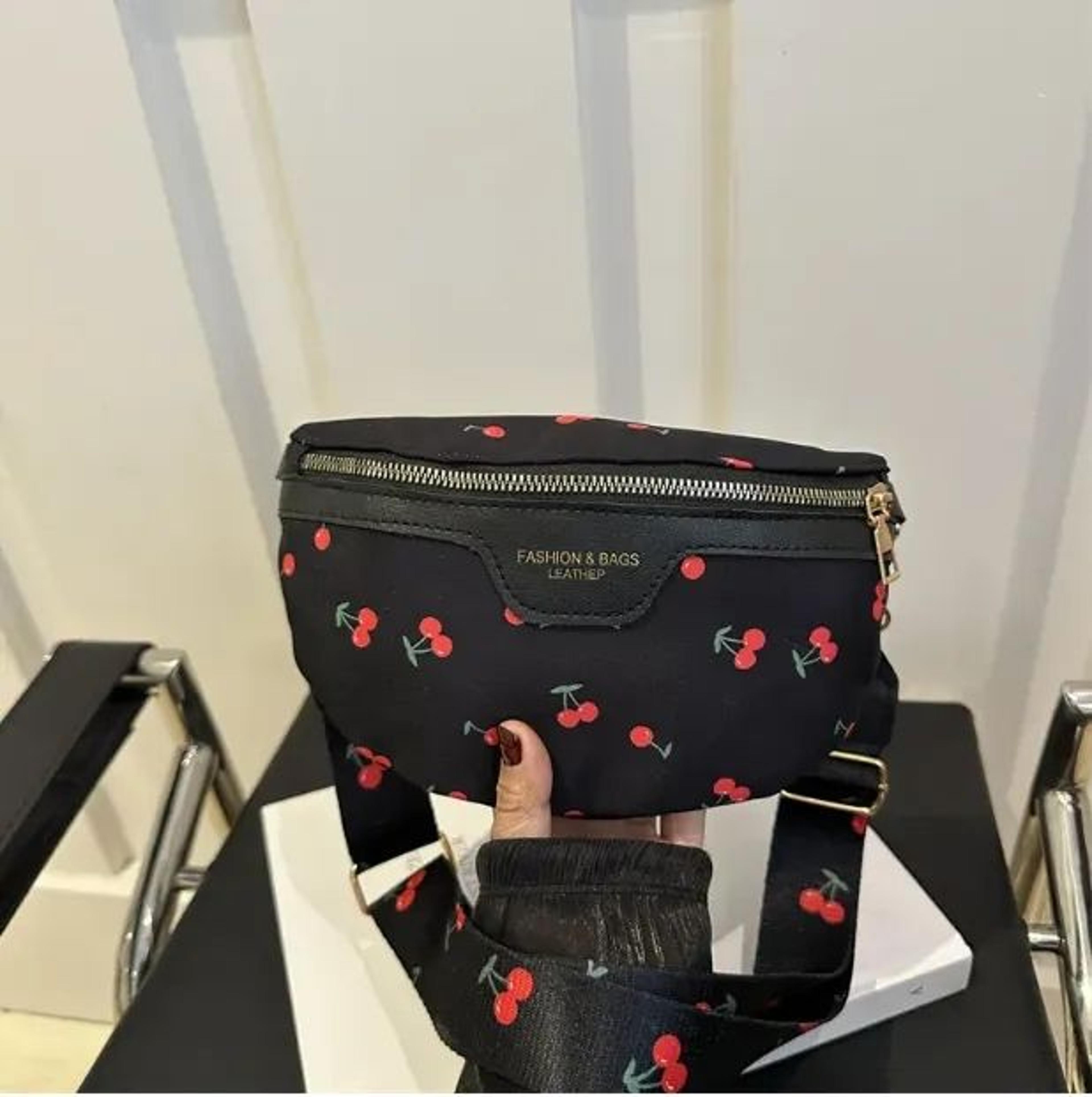 women cherry print crossbody bag with minimalist chest sling design